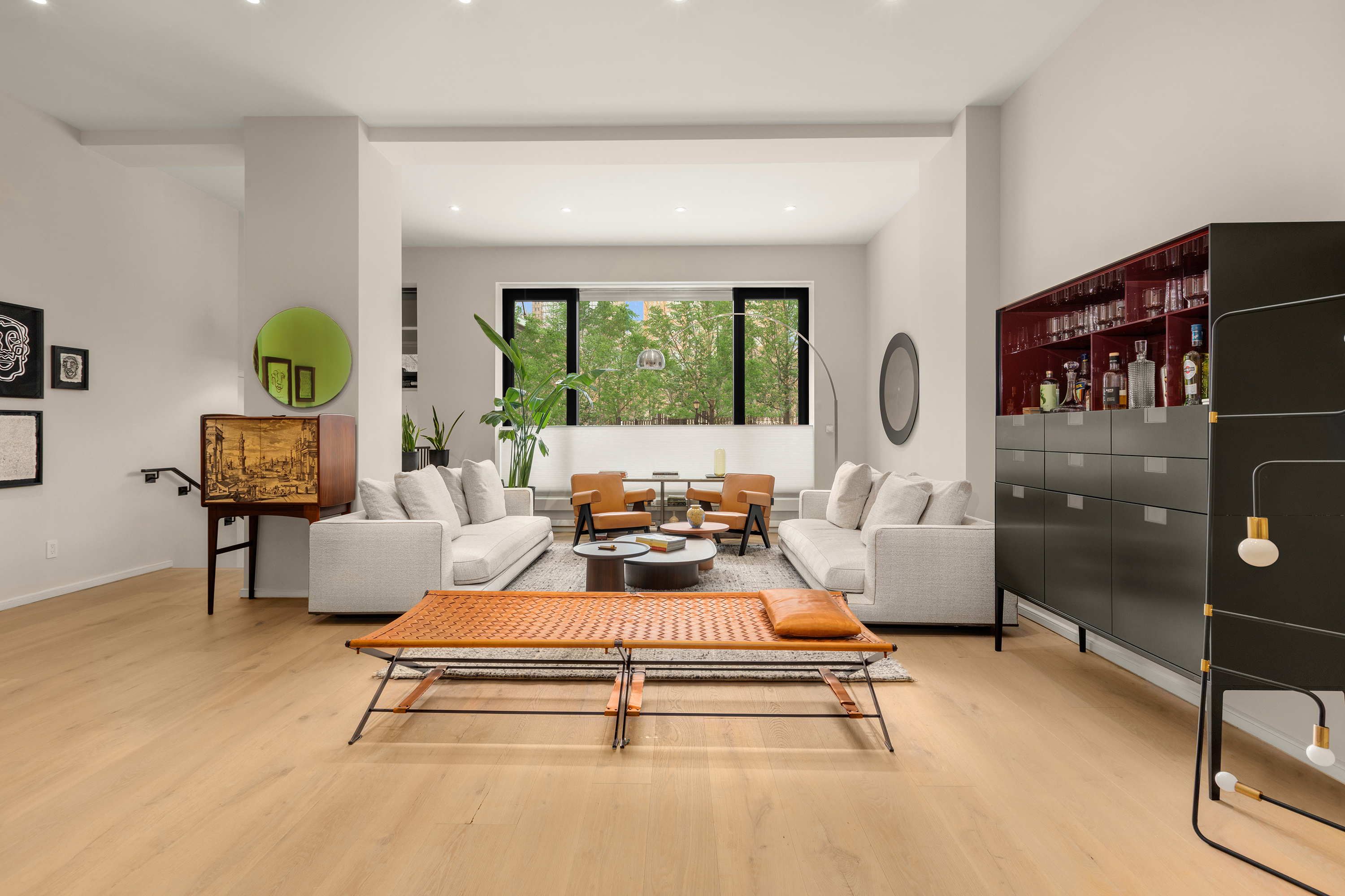 11 Beach Street, Unit THA Manhattan, NY 10013 - Photo 2 of 29 a living room with furniture a window and a flat screen tv