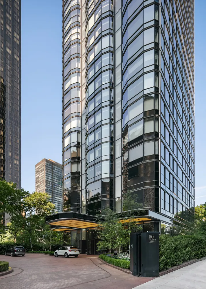 a front view of a building with street view