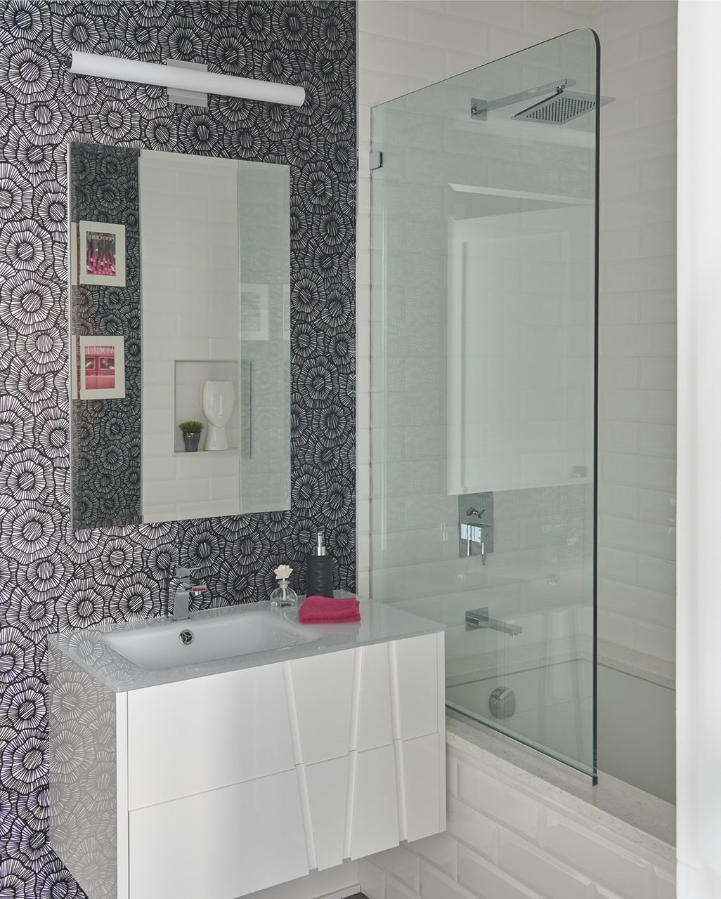 330 Spring Street, Unit 8B Manhattan, NY 10013 - Photo 11 of 14 a bathroom with a bathtub and shower