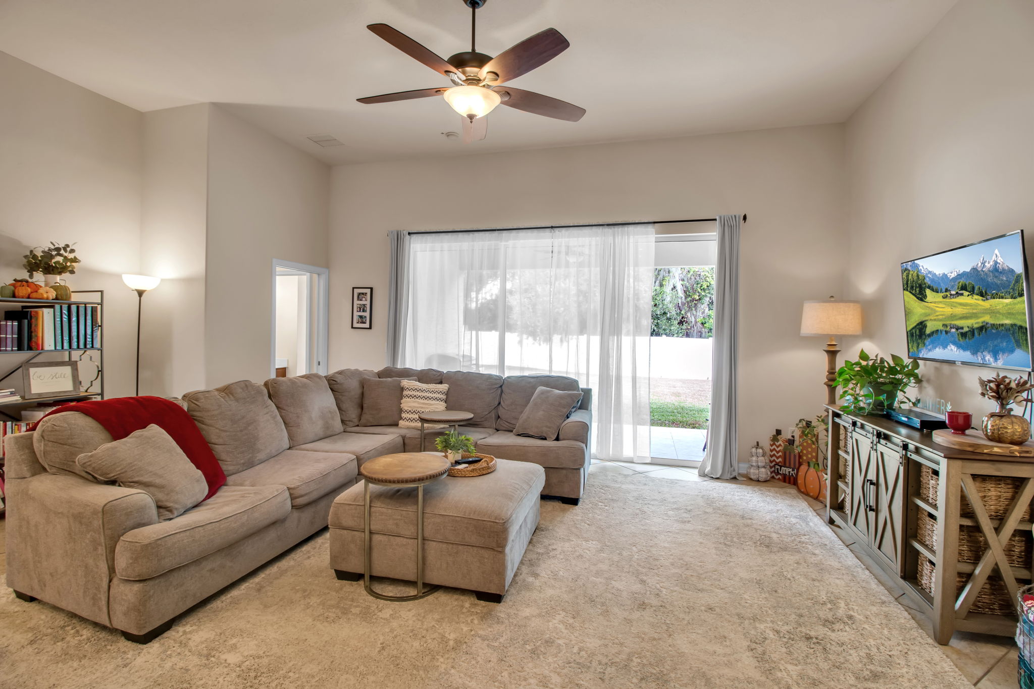 6106 34th Court East Bradenton, FL 34203 - Photo 33 of 69 a living room with furniture and a large window