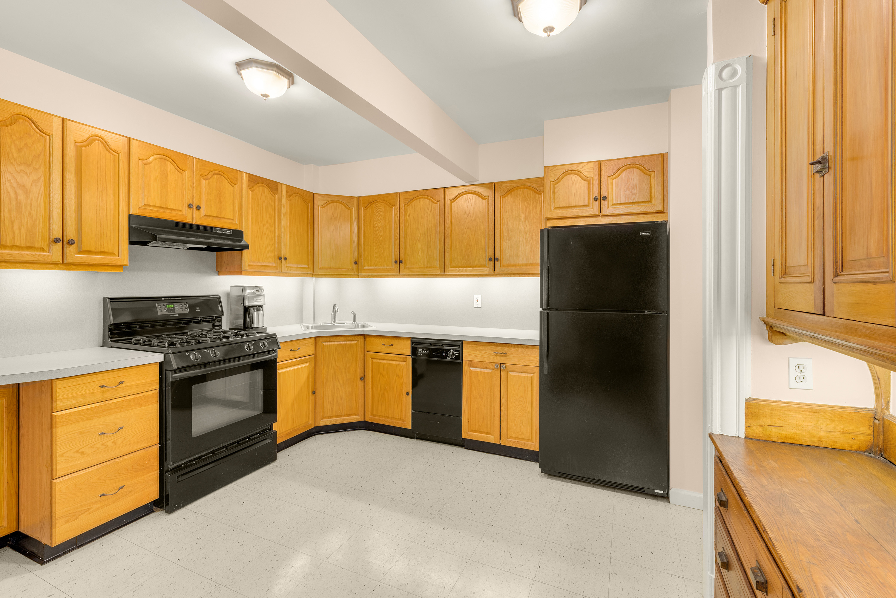 470 9th Street Brooklyn, NY 11215 - Photo 19 of 25 a kitchen with a refrigerator sink and stove