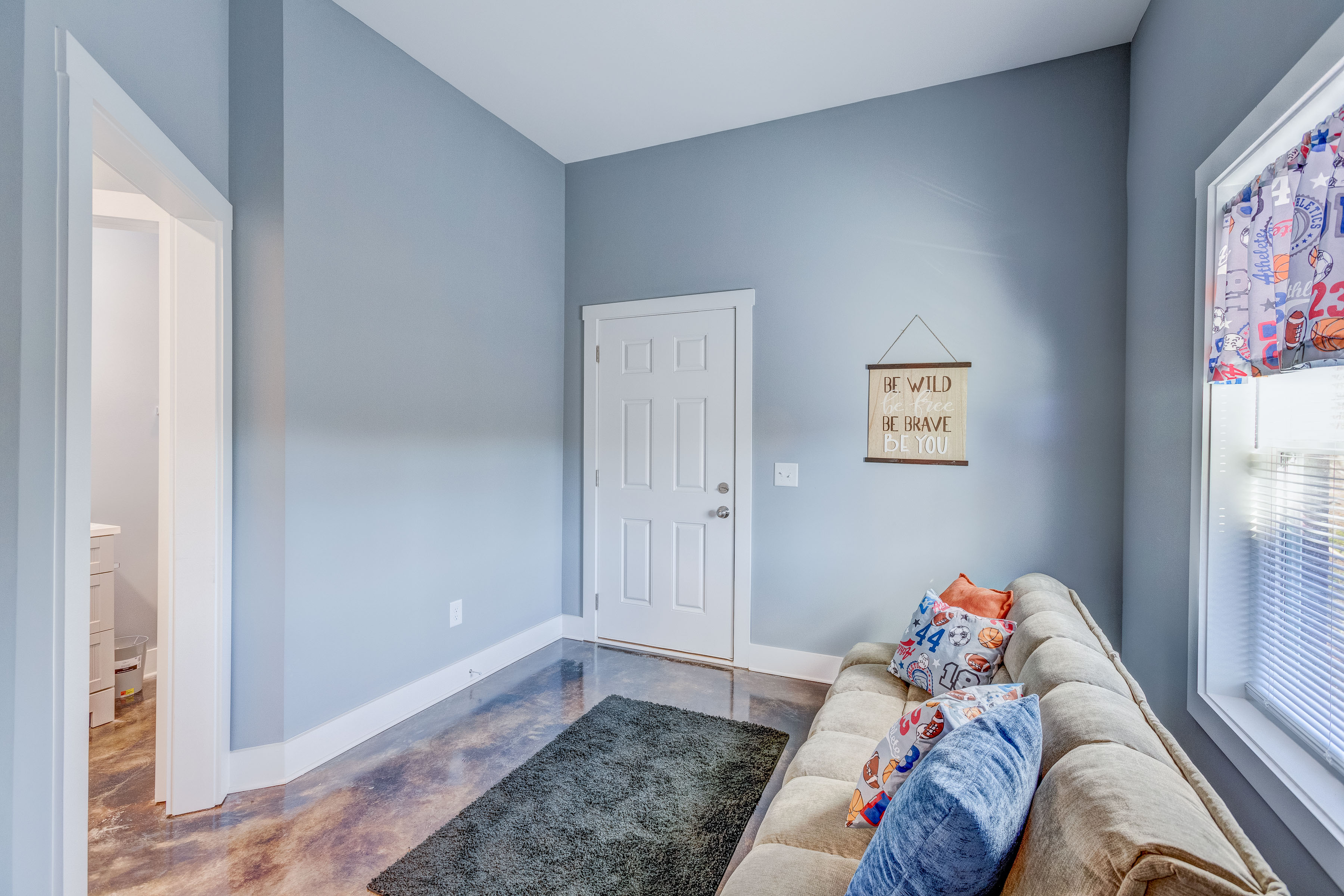 Happy Hollow Road Goodlettsville, TN 37072 - Photo 188 of 203 a bed sitting in a bedroom next to a window