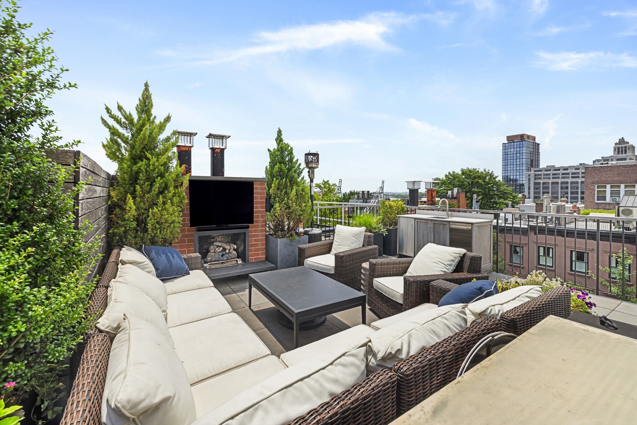 13 Garden Place, Unit B Brooklyn, NY 11201 - Photo 14 of 22 a view of a terrace with couches and lounge chair