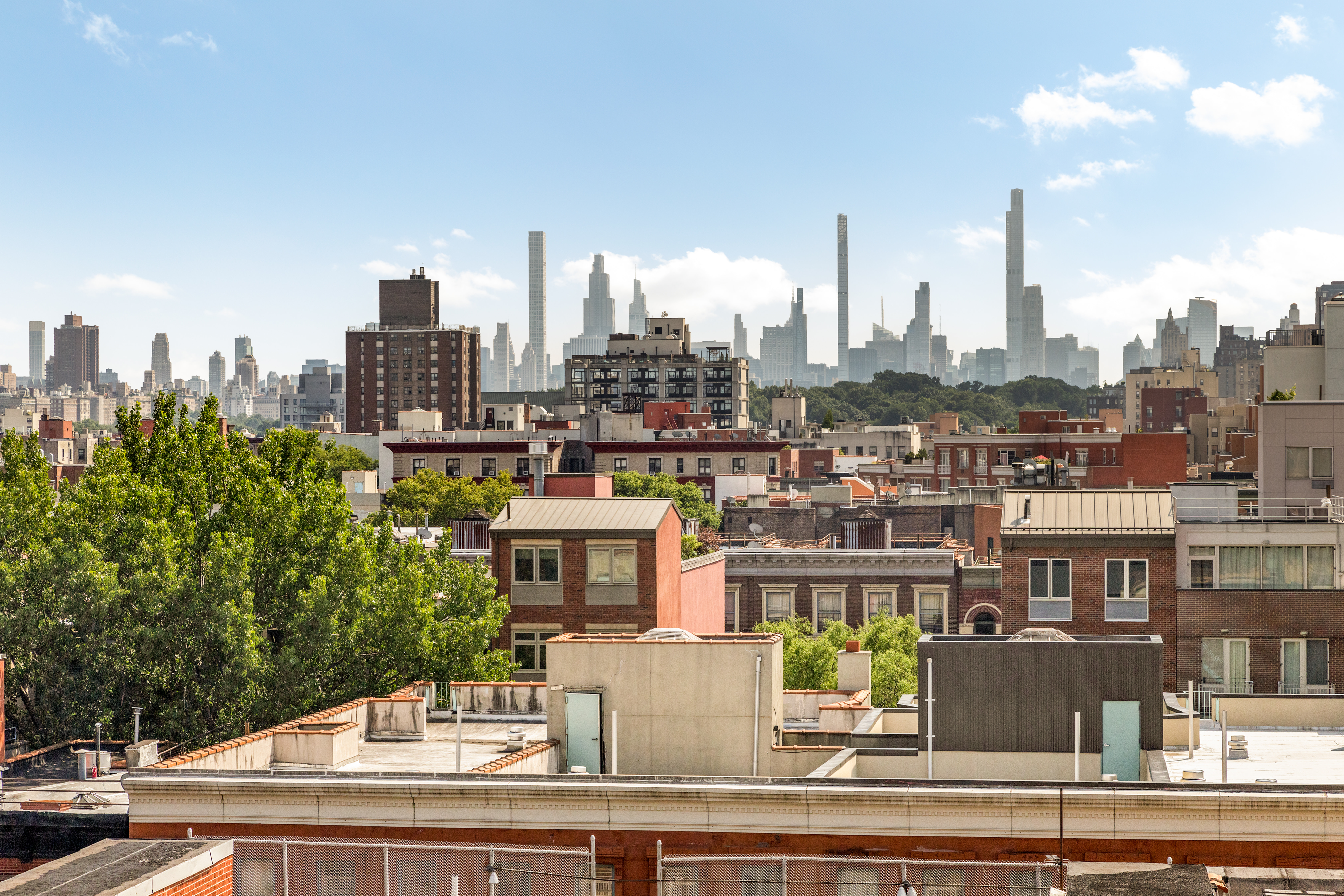 2300 Frederick Douglass Boulevard, Unit 9F Manhattan, NY 10027 - Photo 7 of 15 a view of a city with tall buildings