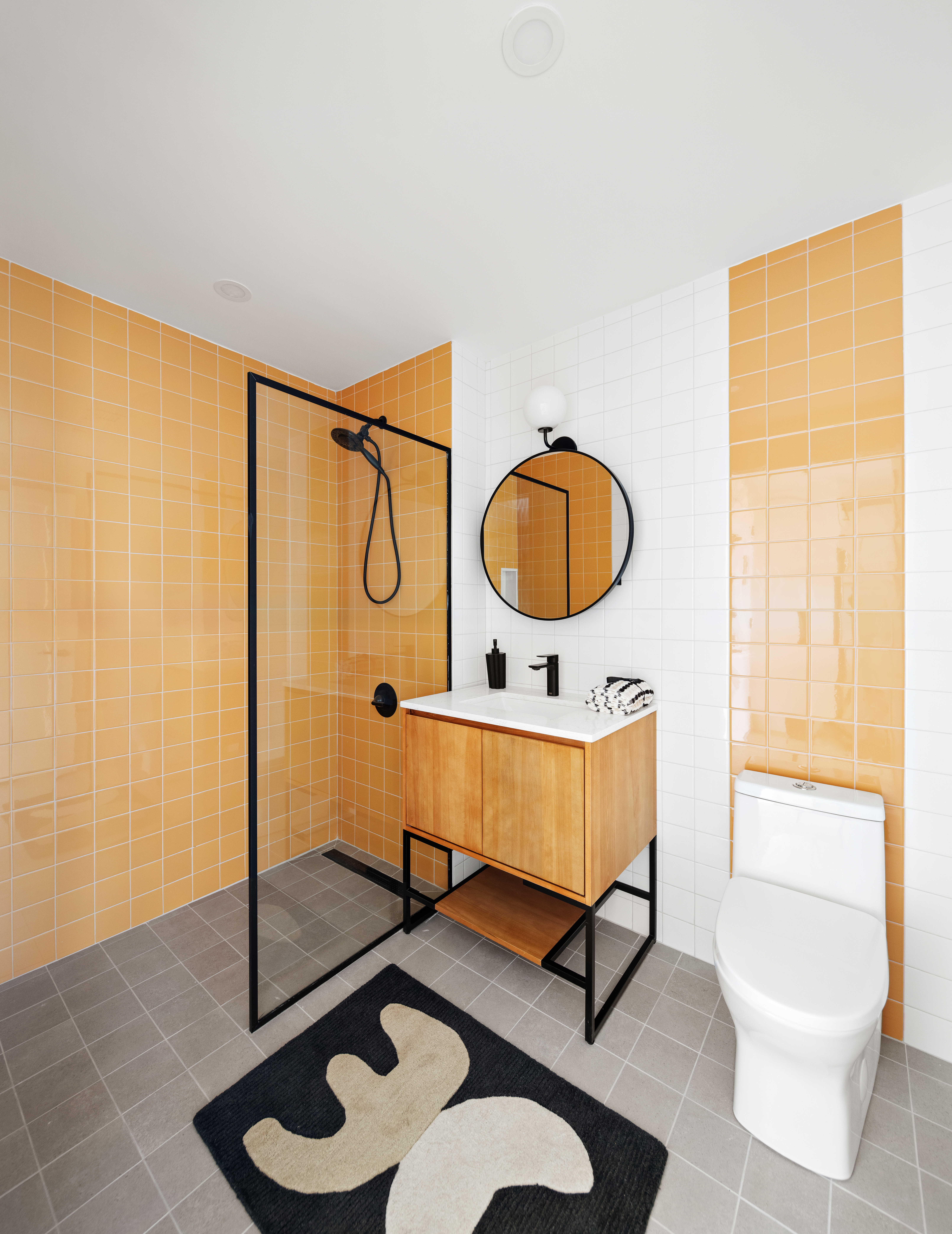 130 East 177th Street, Unit 10A Bronx, NY 10453 - Photo 4 of 16 a living room with furniture and a window