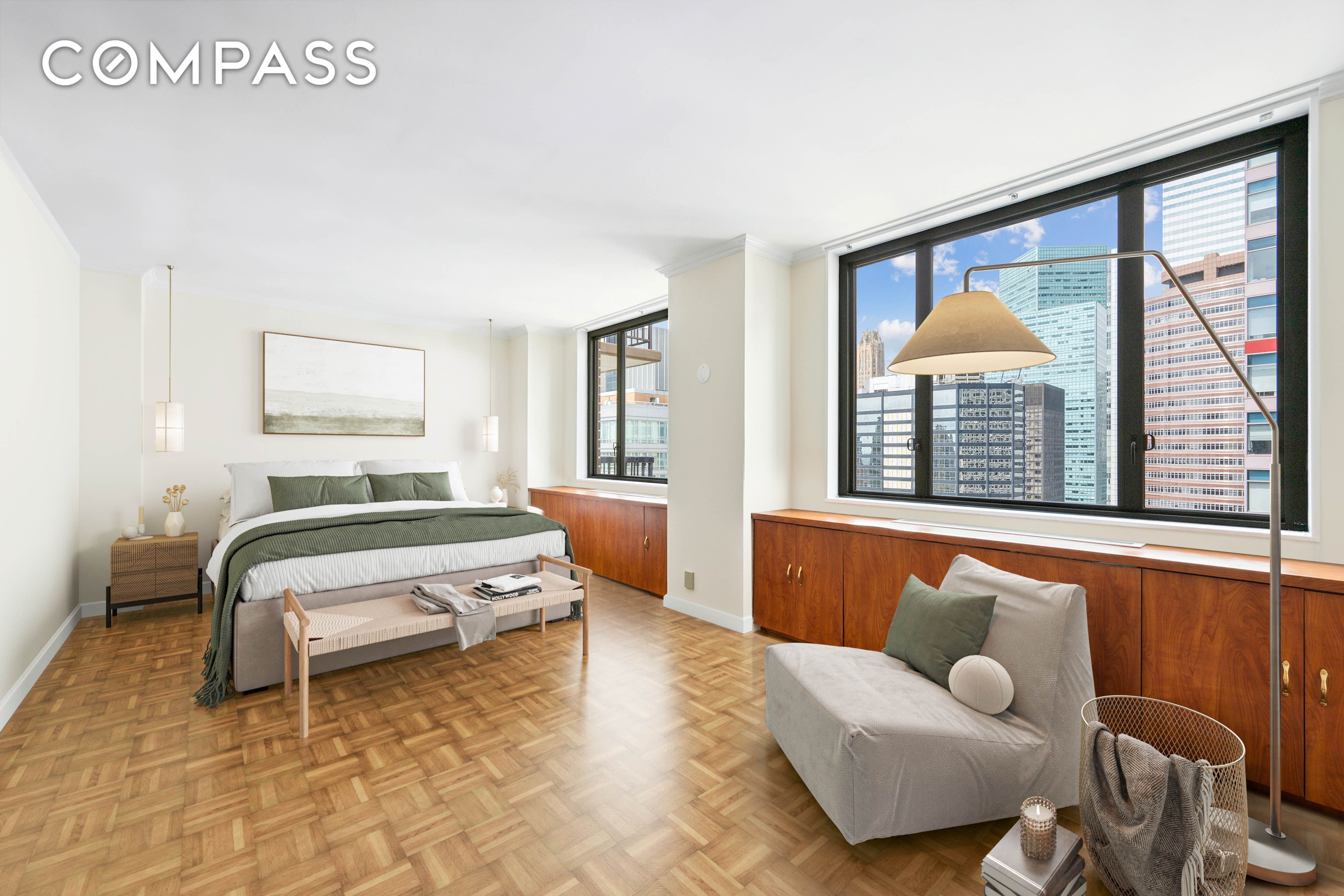 300 East 54th Street, Unit 34GF Manhattan, NY 10022 - Photo 3 of 16 a bedroom with furniture and a large window