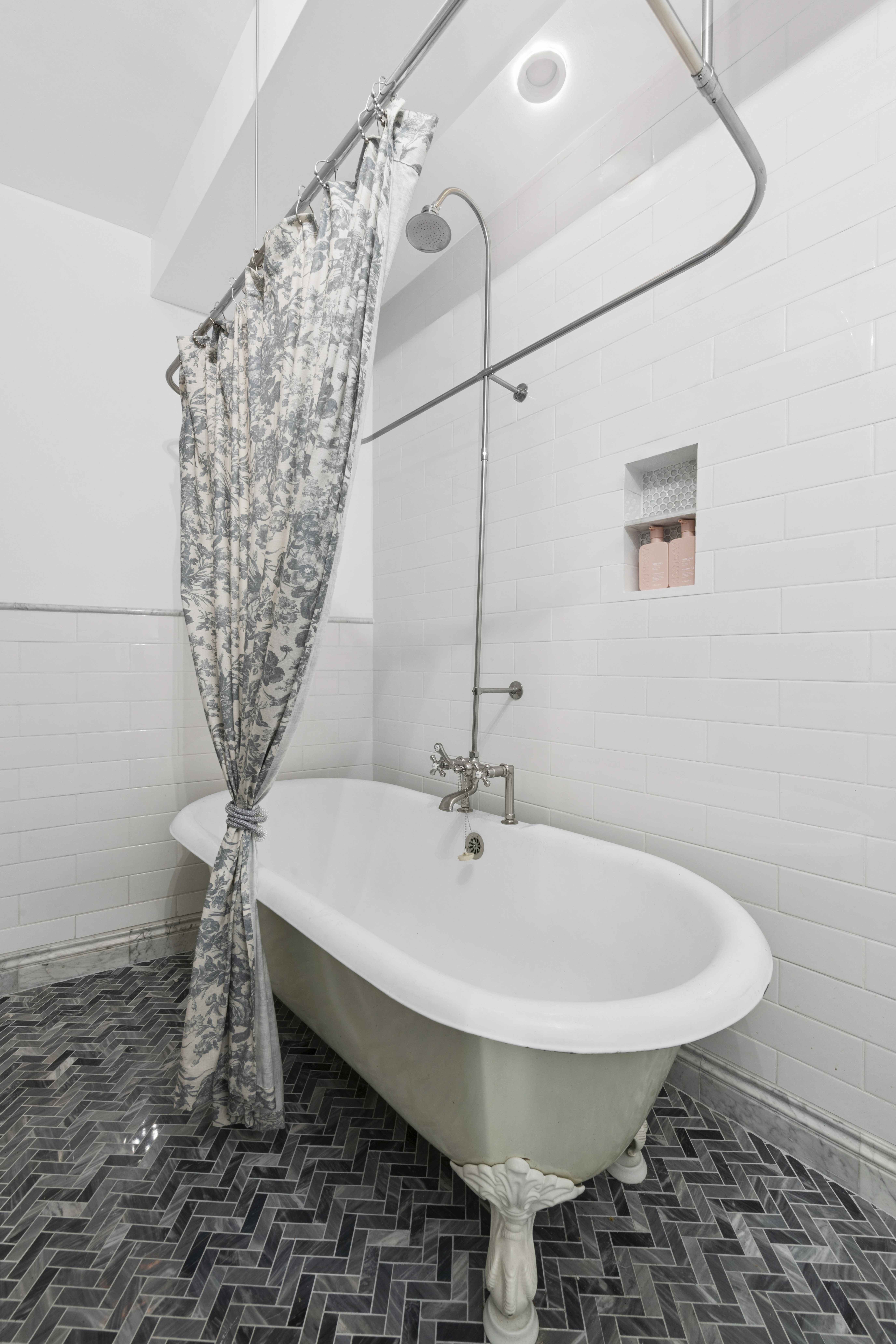 350 East 62nd Street, Unit PHD Manhattan, NY 10065 - Photo 11 of 15 a bathroom with a sink and mirror