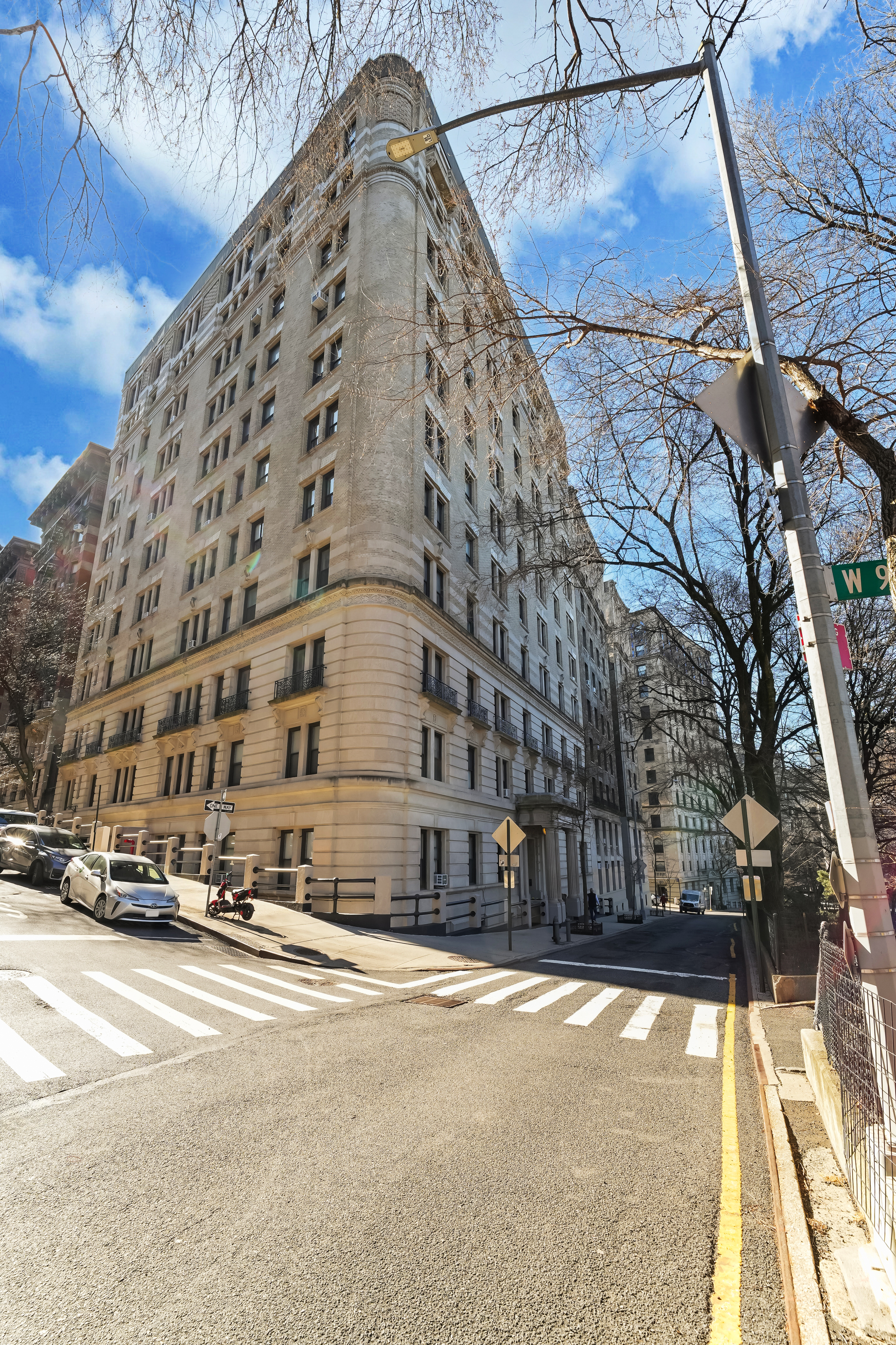 265 Riverside Drive, Unit 11F Manhattan, NY 10025 - Photo 17 of 18 a building with trees in front of it