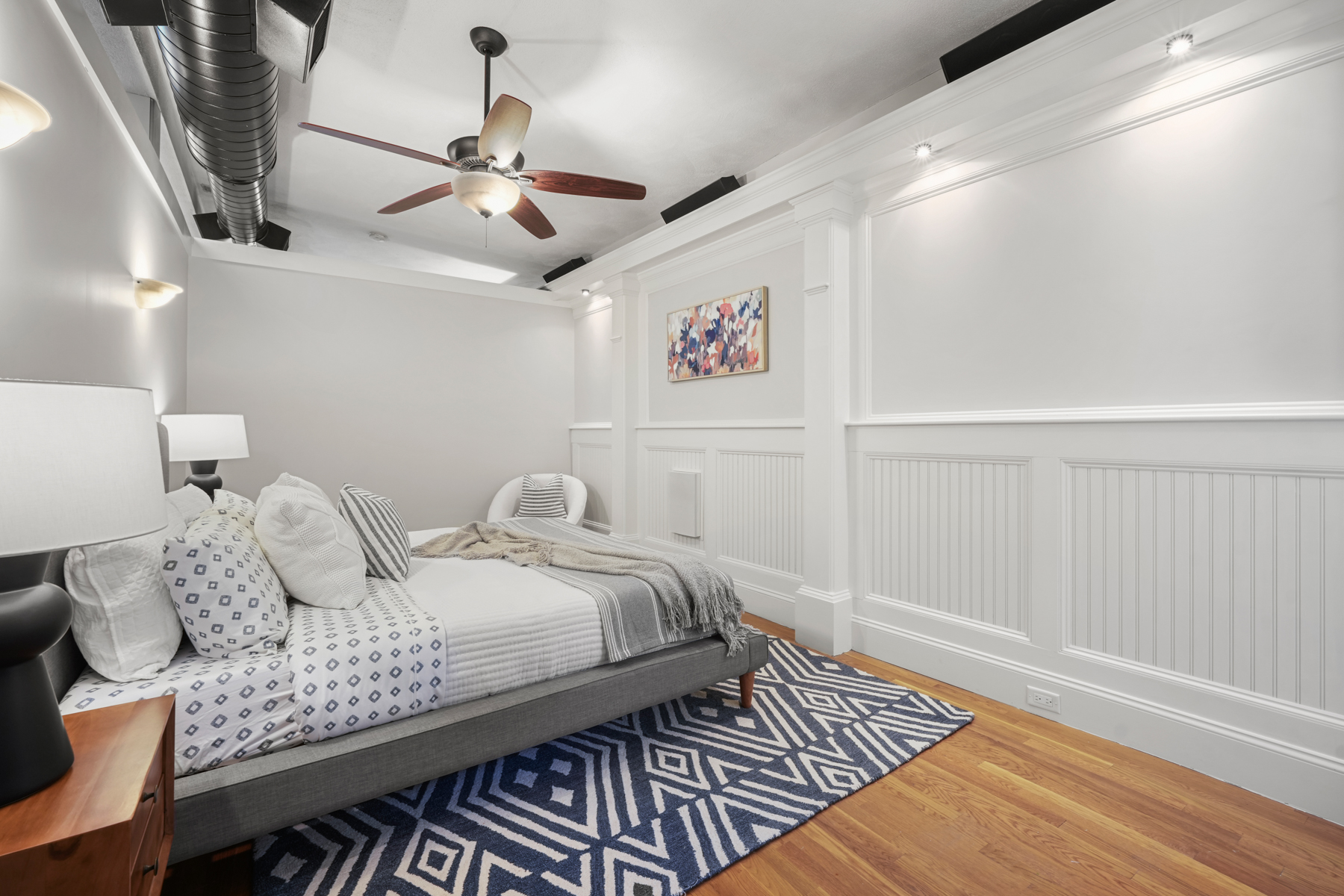 509 Franklin Street, Unit 4 Cambridge, MA 02139 - Photo 13 of 20 a bedroom with bed and wooden floor