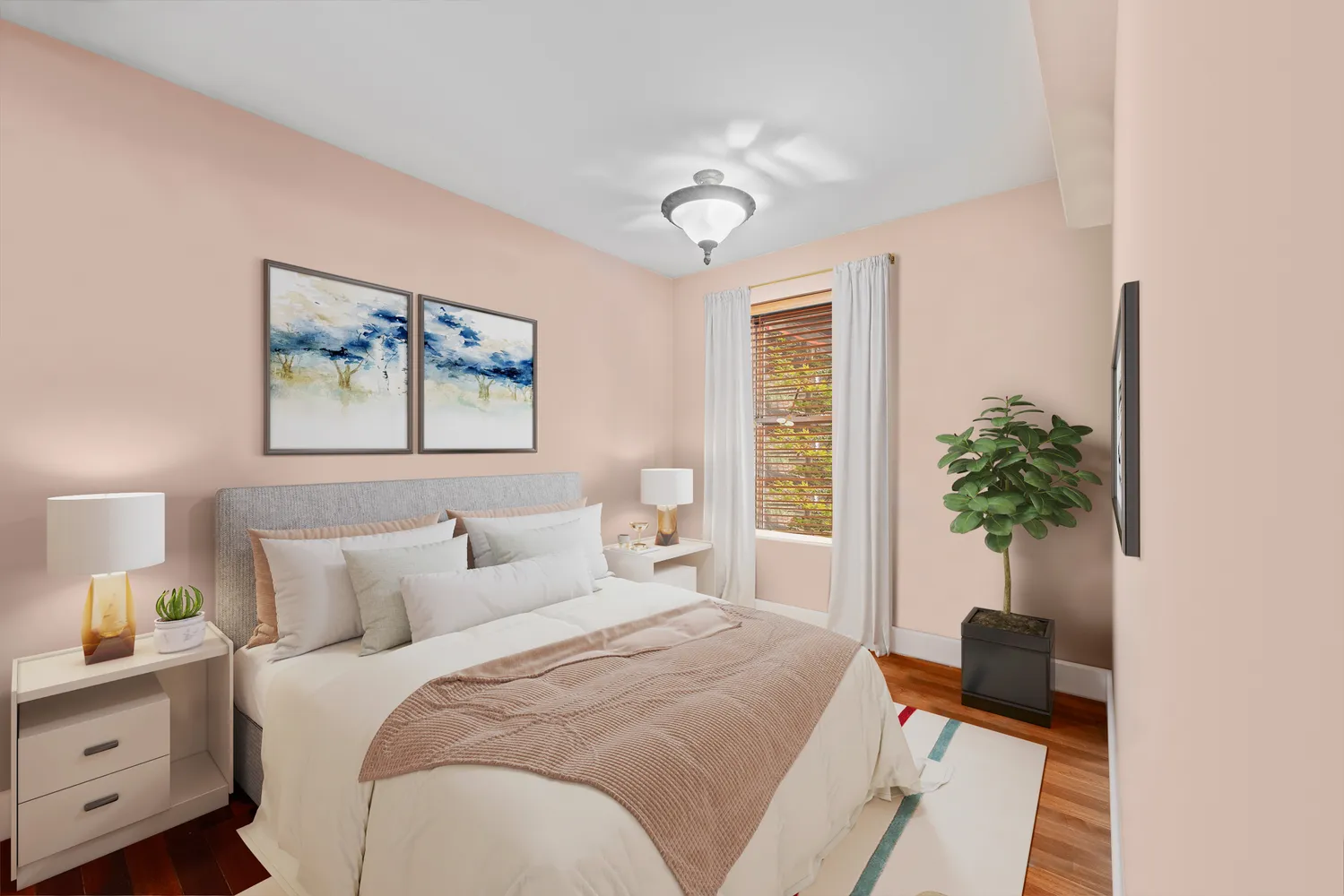 a bedroom with a bed and a potted plant