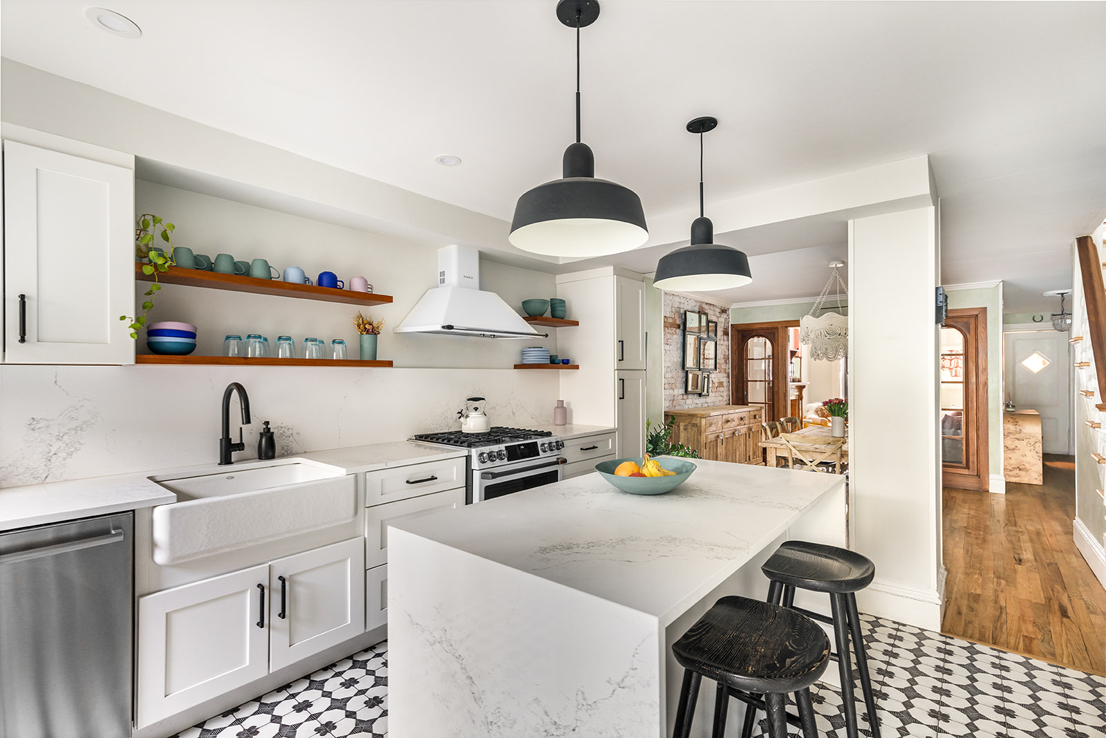 331 A Stuyvesant Avenue Brooklyn, NY 11233 - Photo 4 of 21 a kitchen with a sink a stove and chairs