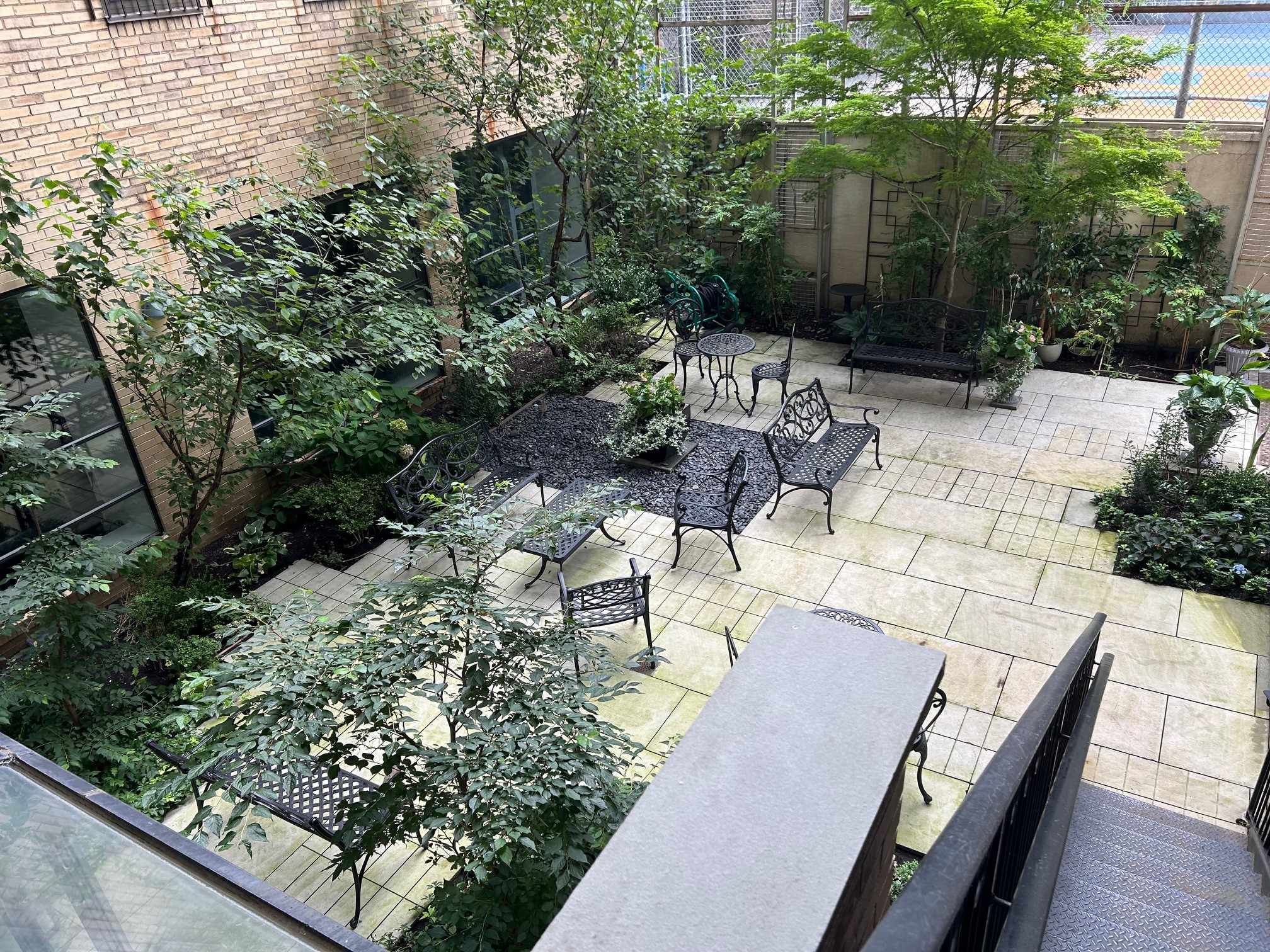 230 Riverside Drive, Unit 14AC Manhattan, NY 10025 - Photo 22 of 30 a view of yard with outdoor seating