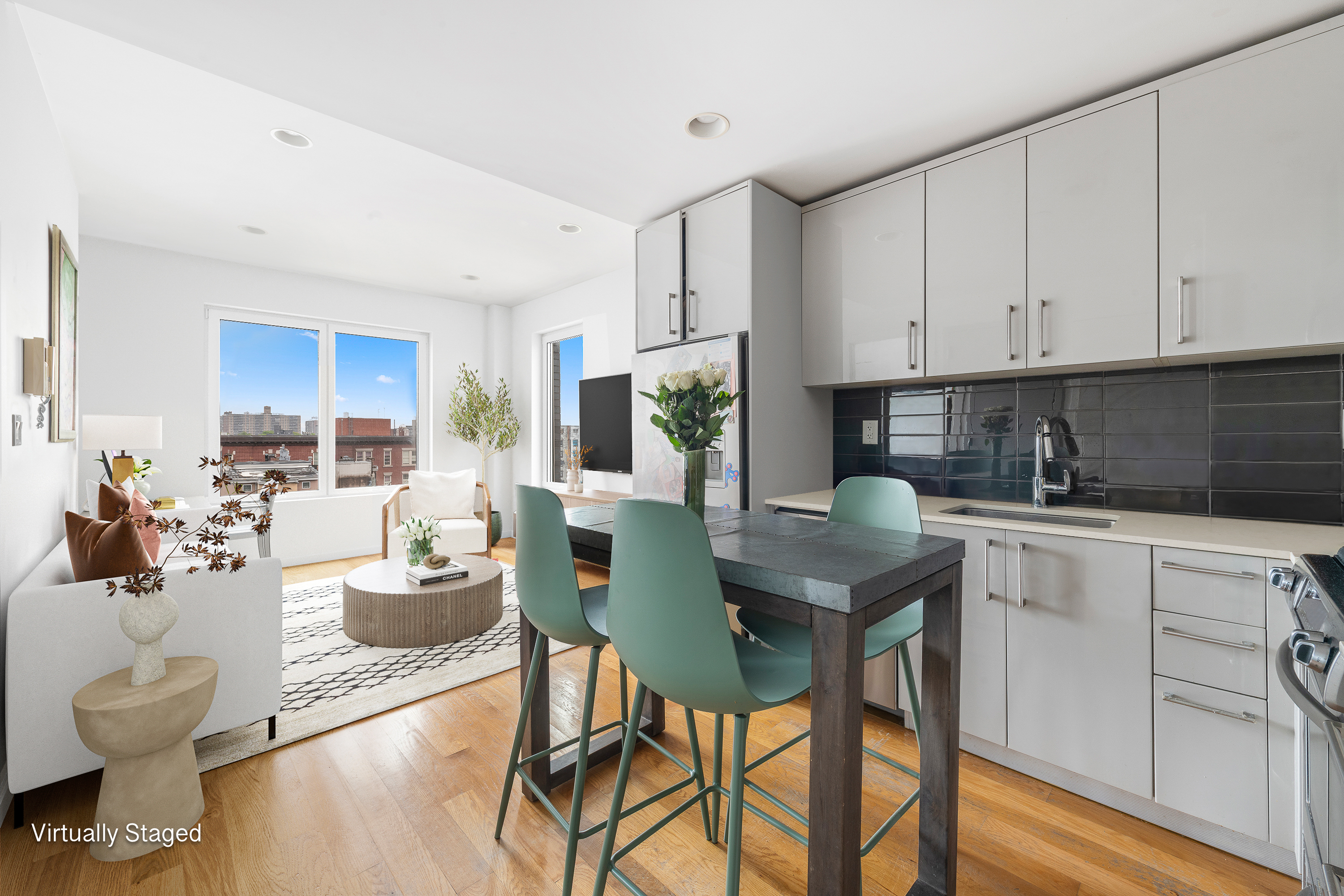 139 Skillman Avenue, Unit 7B Brooklyn, NY 11211 - Photo 2 of 12 a kitchen with a table chairs stove and white cabinets