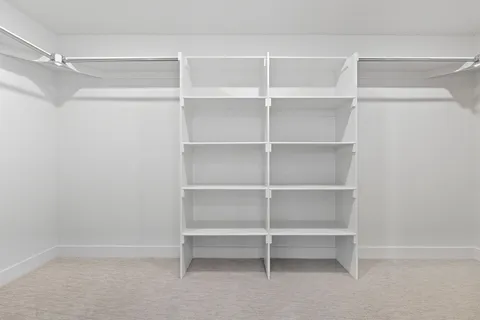 a view of staircase with white walls and white walls