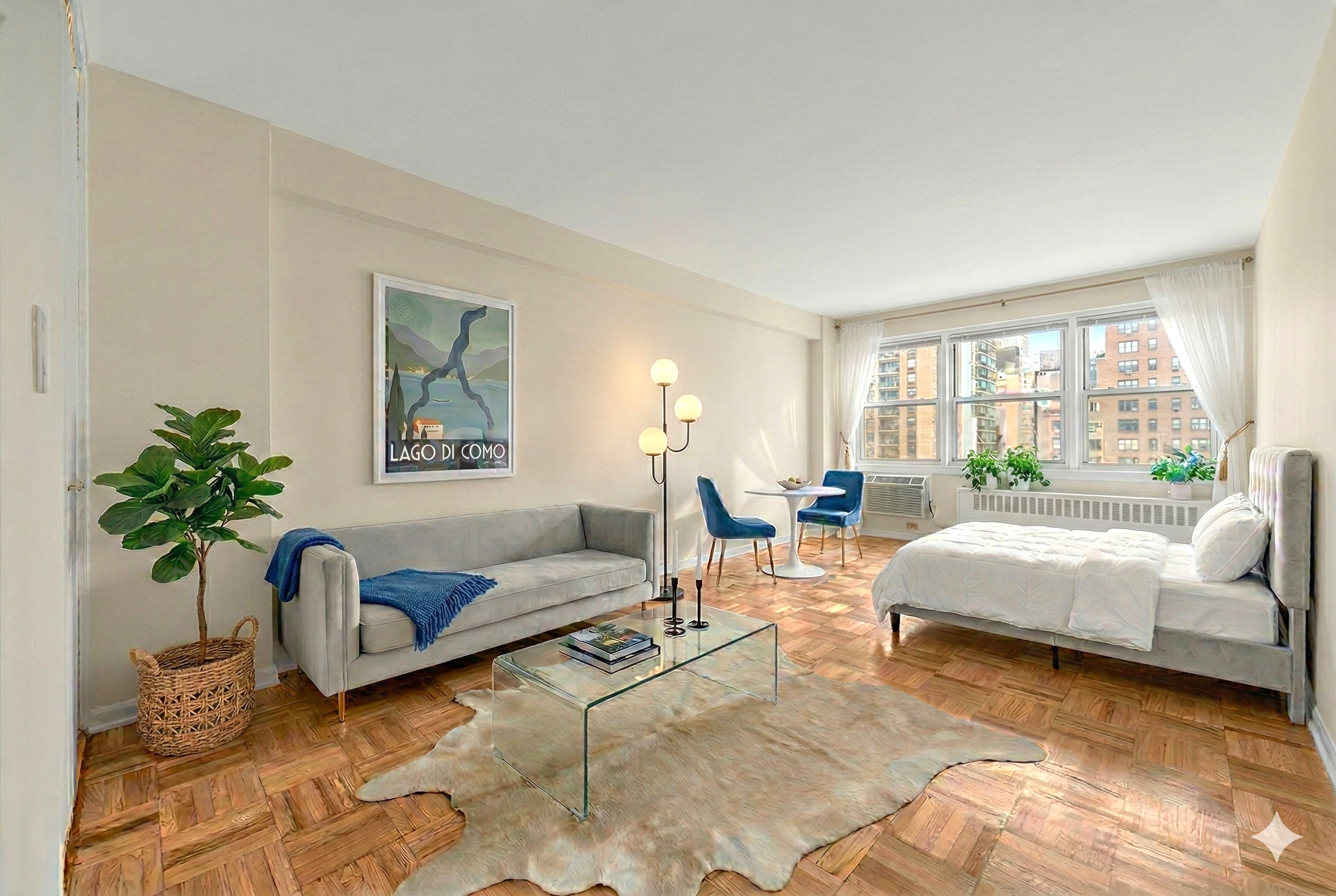 150 East 37th Street, Unit 10F Manhattan, NY 10016 - Photo 1 of 20 a living room with furniture and a potted plant