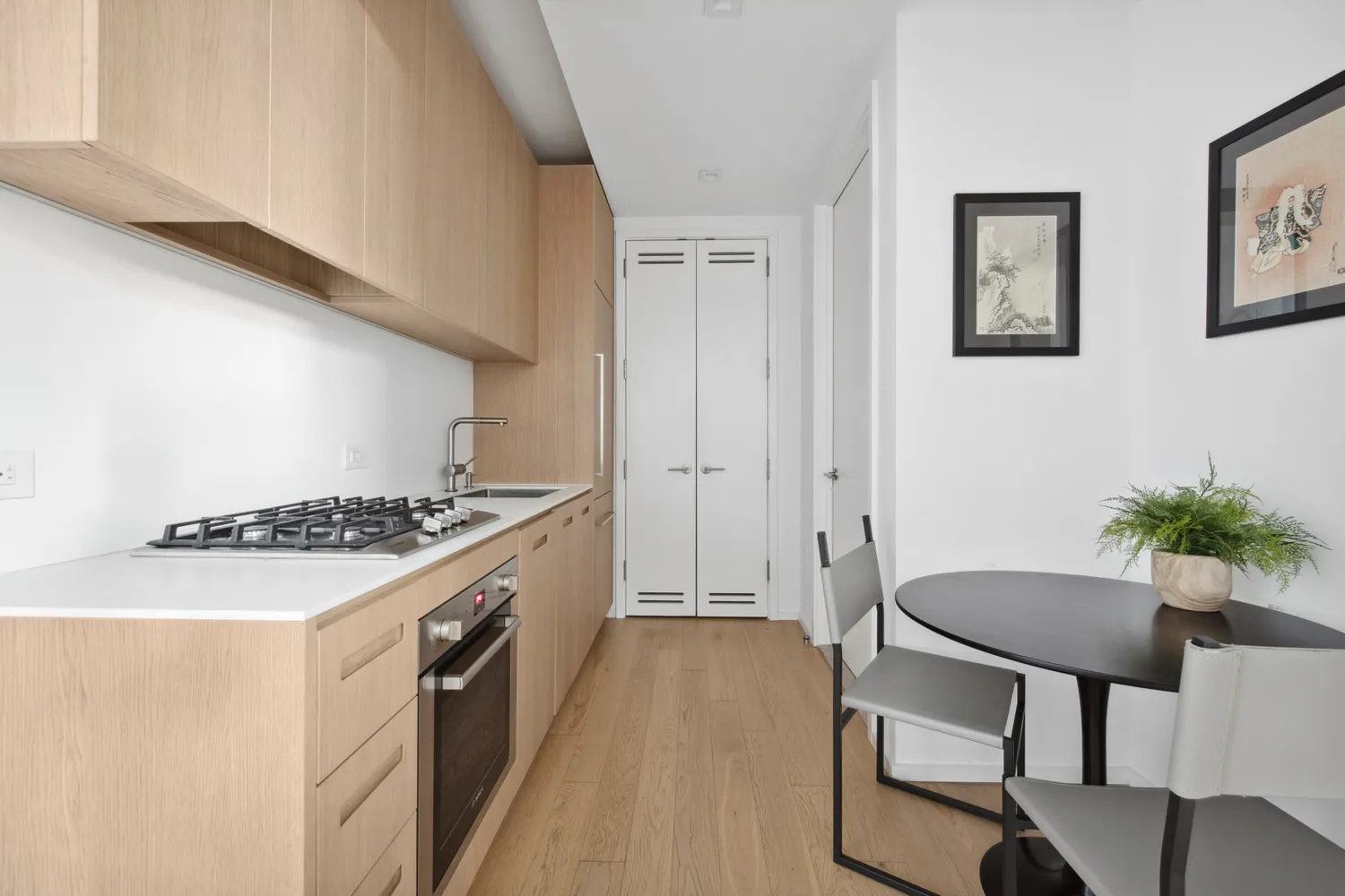 a kitchen with furniture and a stove