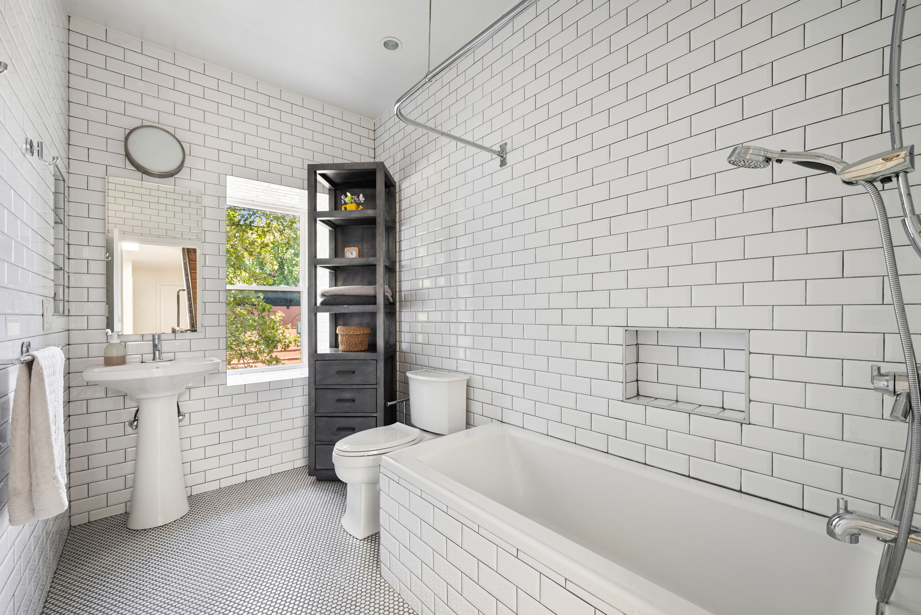 827 Marcy Avenue Brooklyn, NY 11216 - Photo 11 of 17 a bathroom with a bathtub and shower