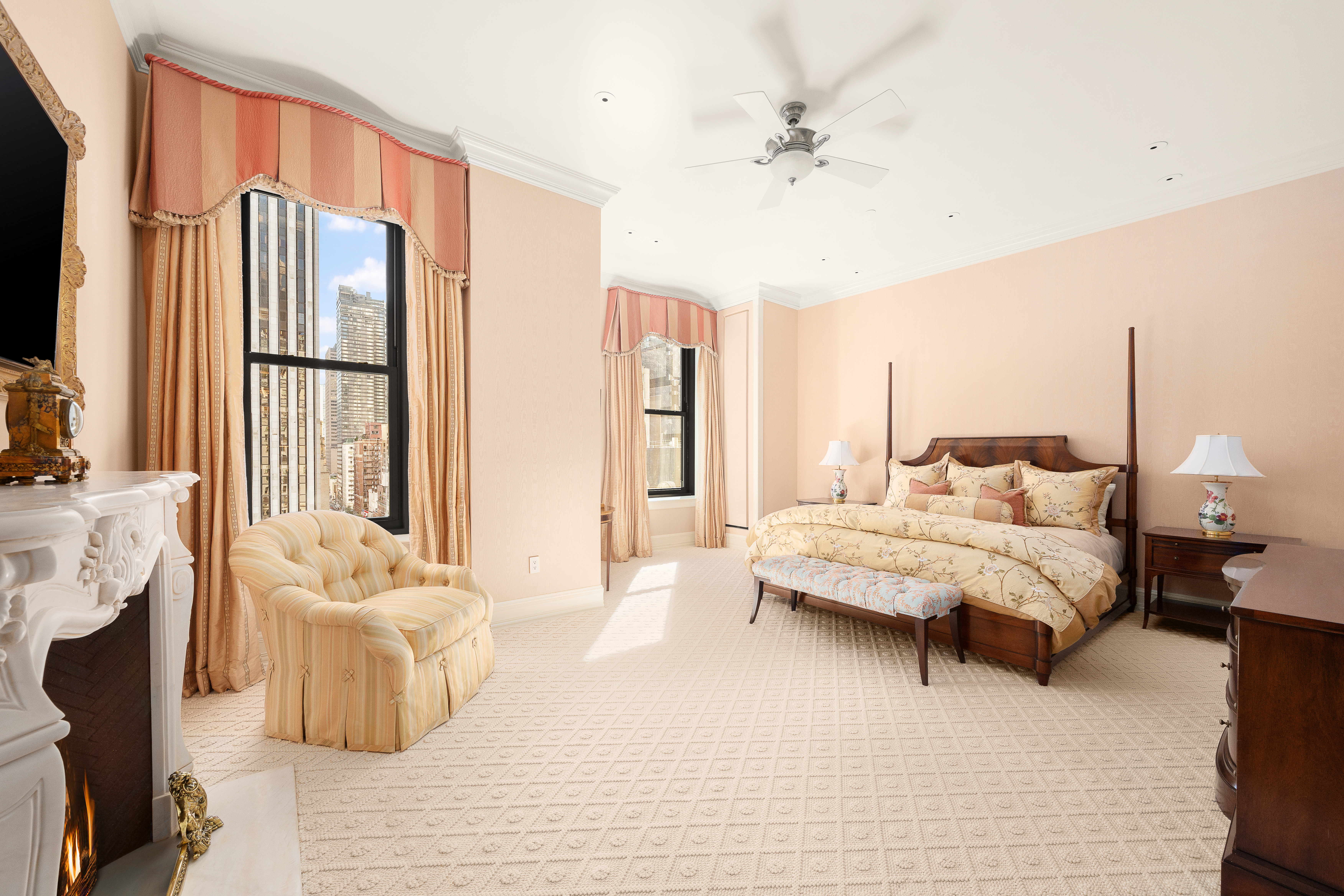 1 Central Park South, Unit 1013 Manhattan, NY 10019 - Photo 9 of 32 a spacious bedroom with a bed and glass walk in closet