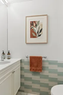 a bathroom with a toilet and a sink