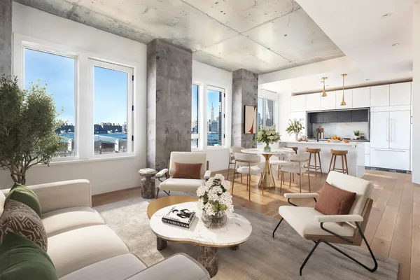 a living room with furniture kitchen view and a large window