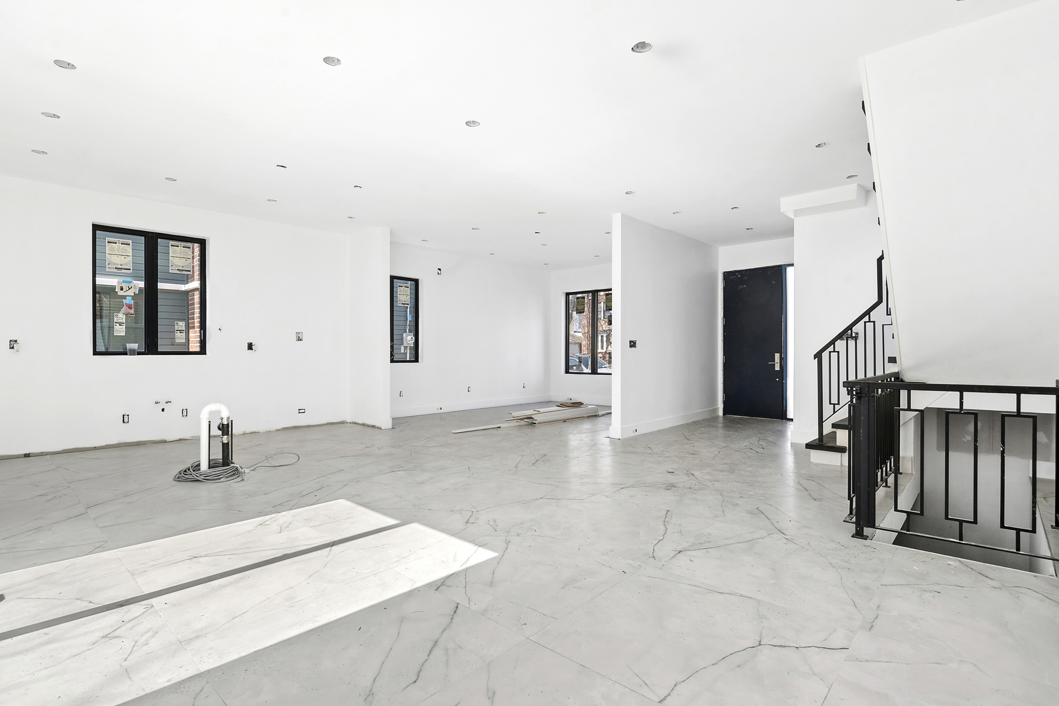 3624 Avenue P Brooklyn, NY 11234 - Photo 5 of 26 a view of a livingroom with wooden floor and staircase