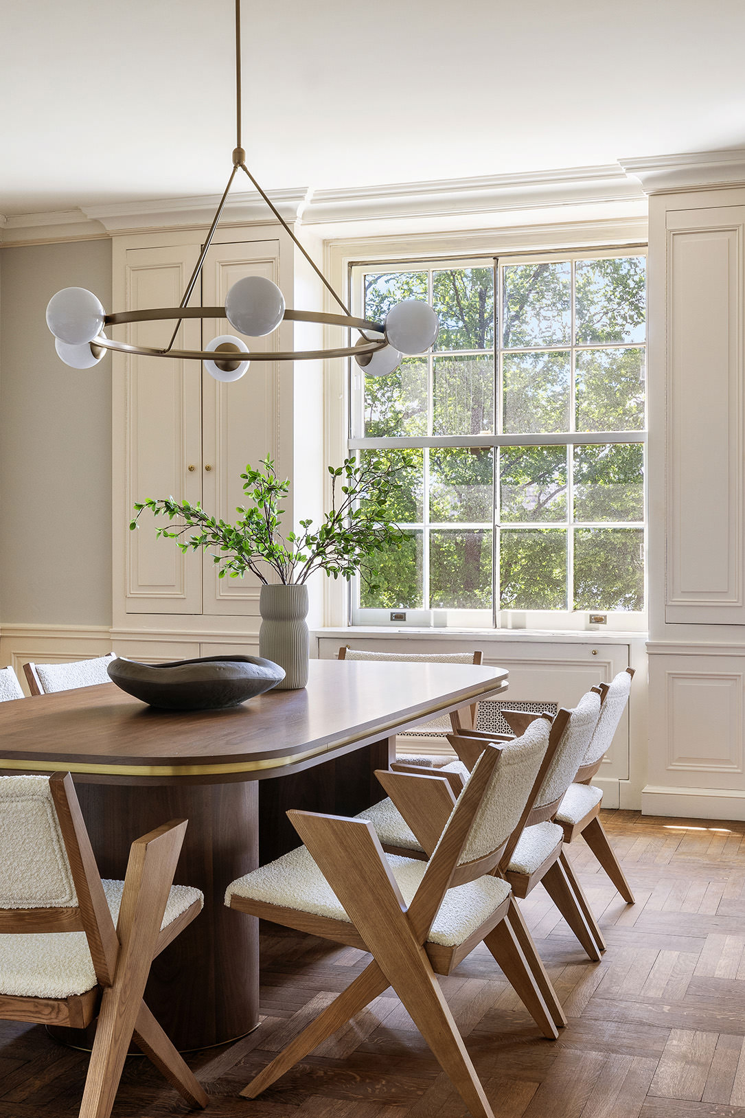 1120 5th Avenue, Unit 7B Manhattan, NY 10128 - Photo 4 of 17 a dining room with a table and chairs