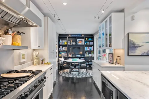 a view of a hallway with workspace