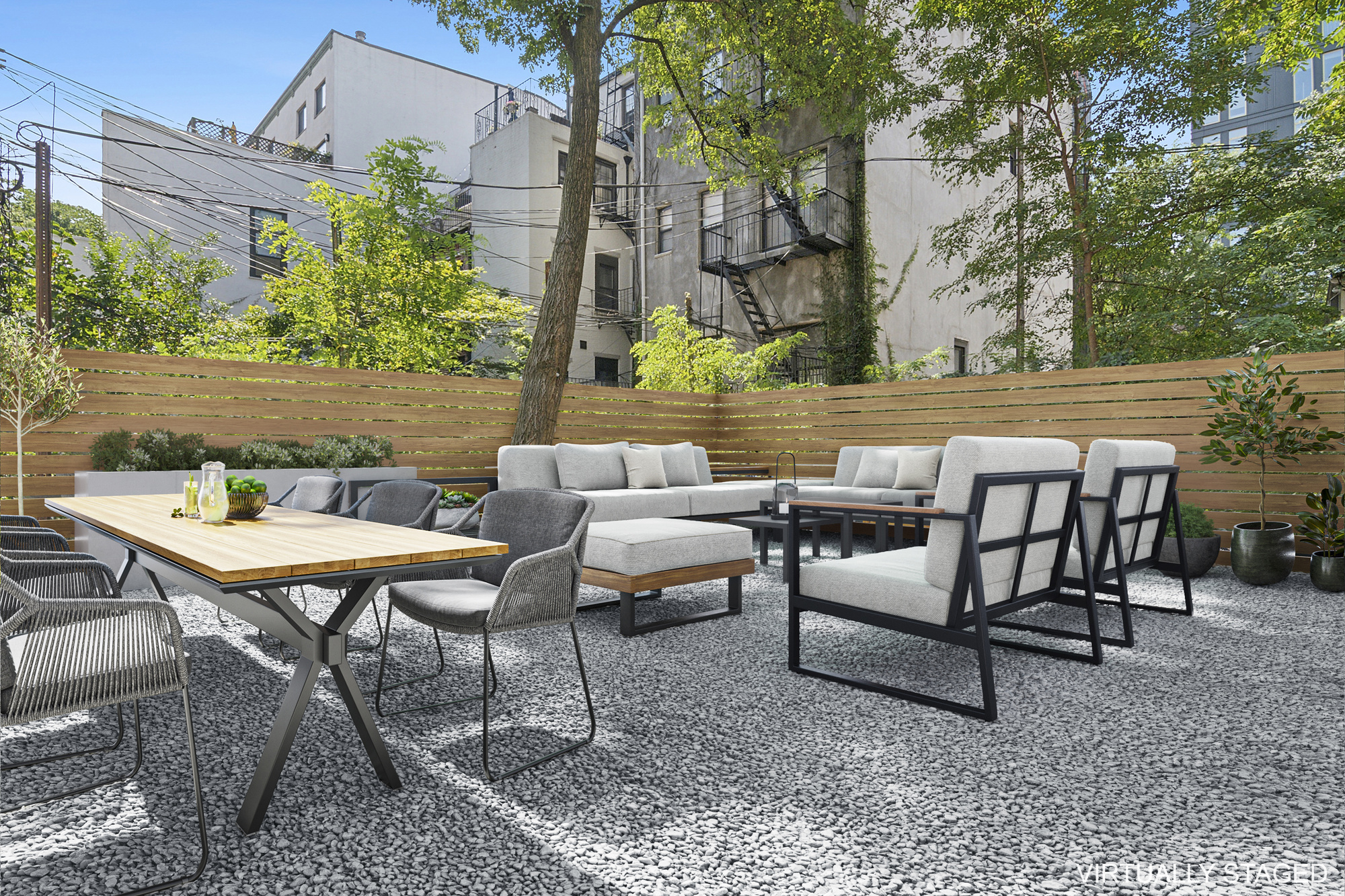 a backyard of a house with outdoor seating