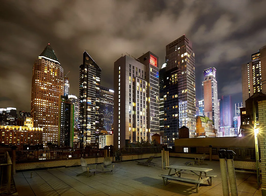 325 West 45th Street, Unit 205 Manhattan, NY 10036 - Photo 8 of 14 a city view with tall buildings