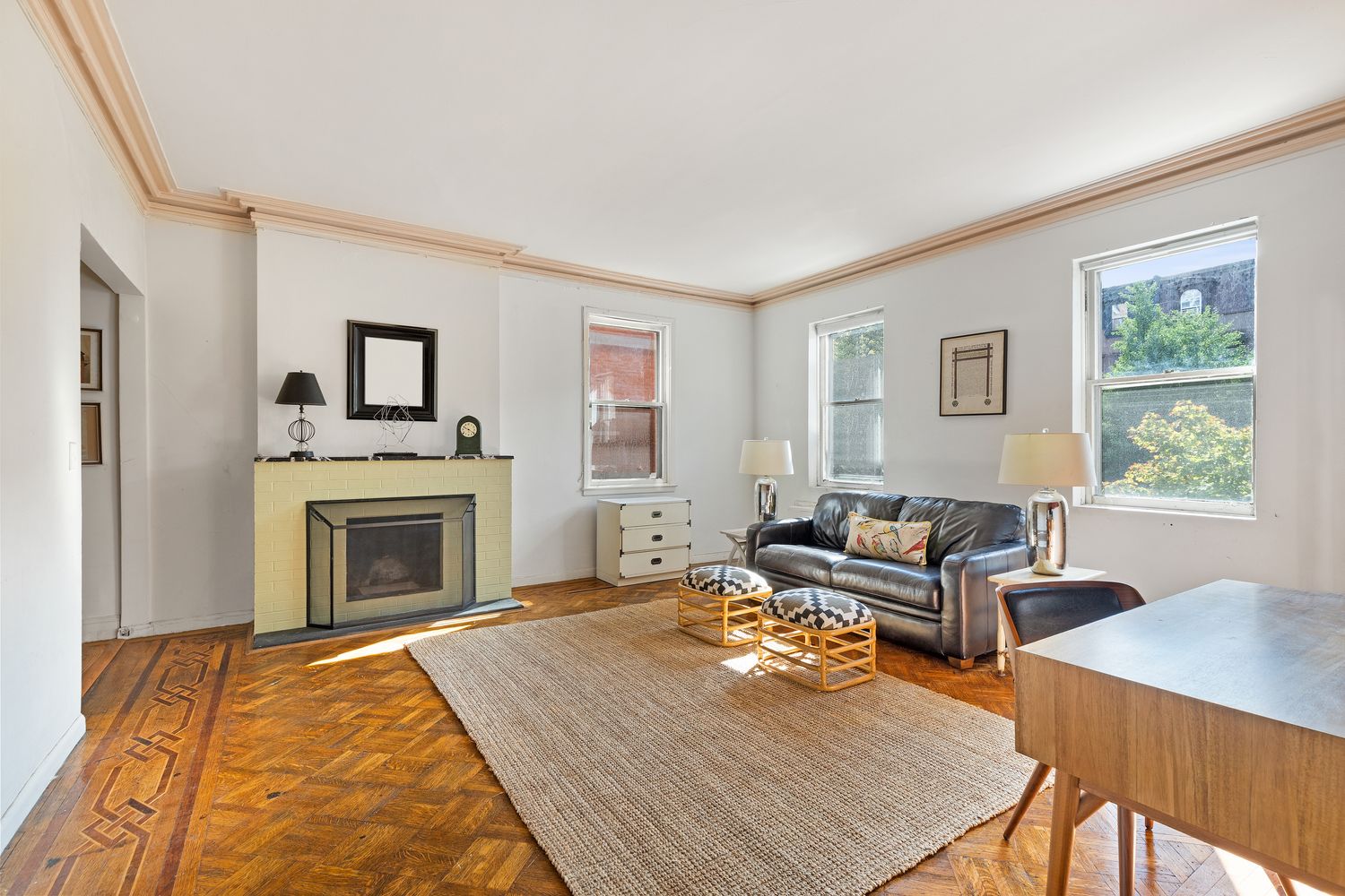 315 Washington Avenue Brooklyn, NY 11205 - Photo 16 of 38 a living room with furniture and a fireplace