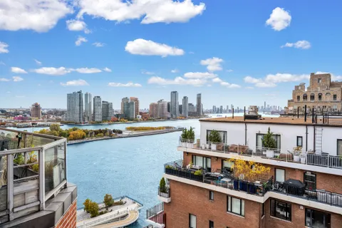 a view of a city with tall buildings