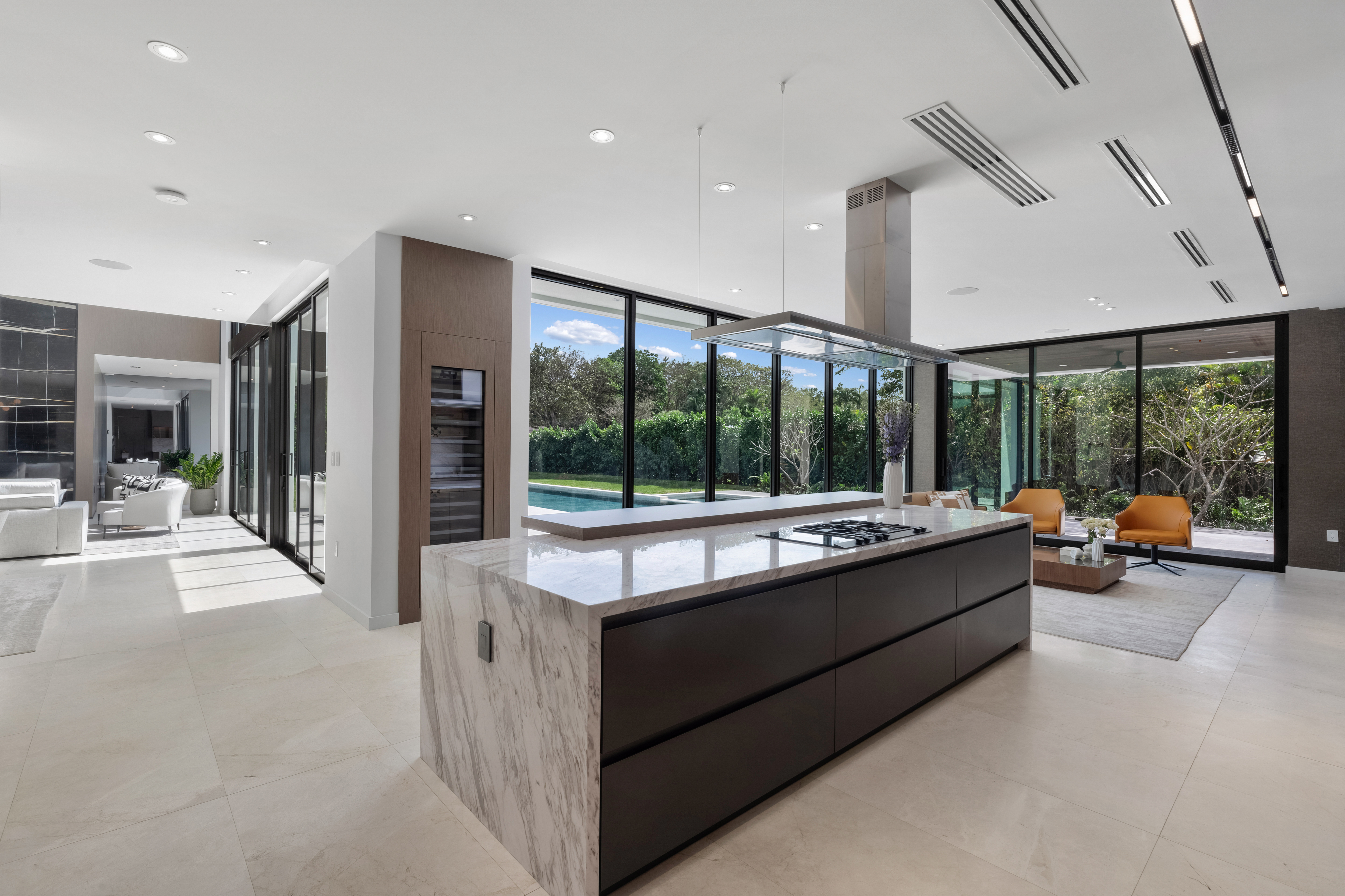 6920 Southwest 124th Street Pinecrest, FL 33156 - Photo 17 of 48 a living room with furniture and large windows