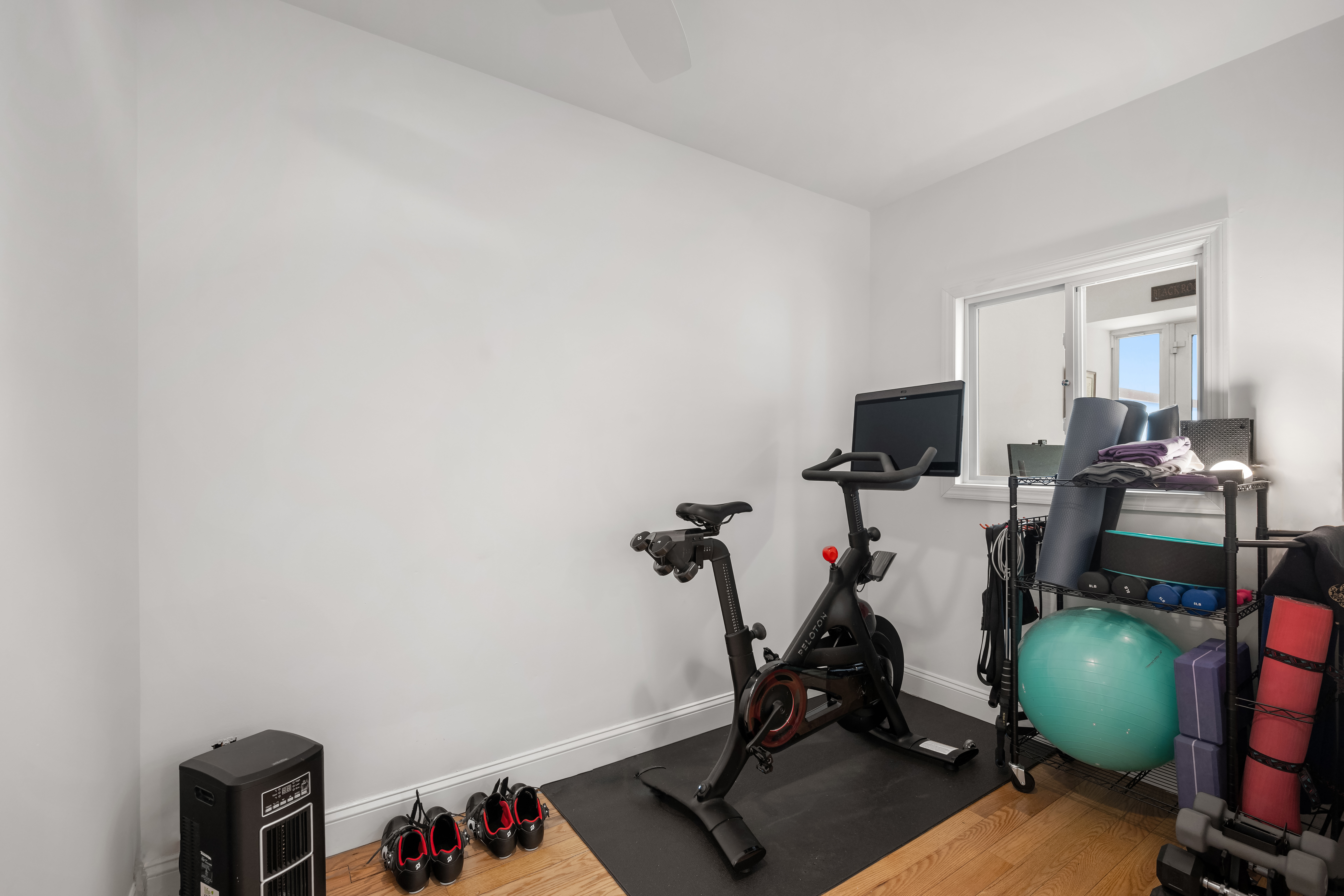 302 West 122nd Street, Unit 1 Manhattan, NY 10027 - Photo 11 of 13 a view of a room with gym equipment