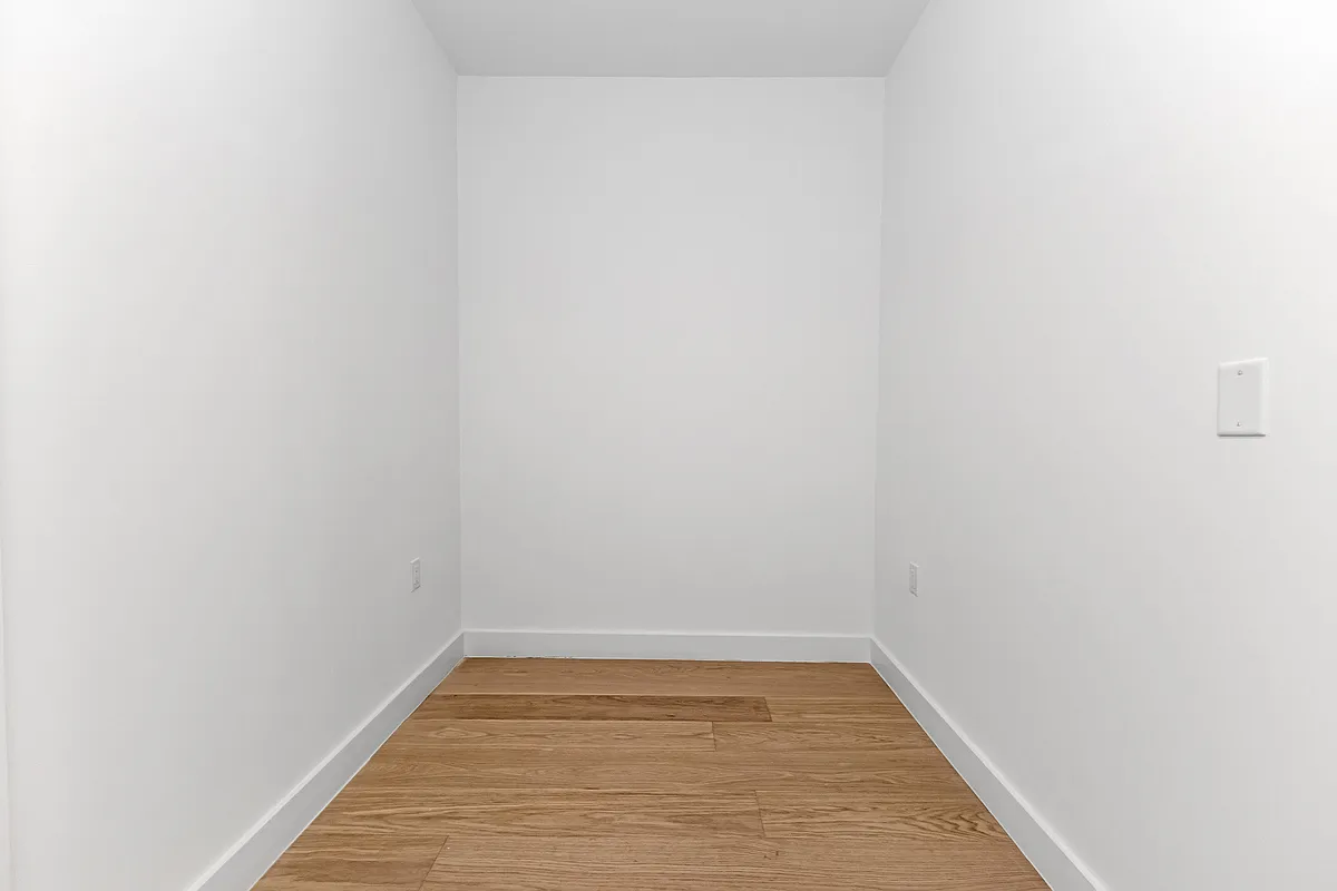 21-10 30th Avenue, Unit 1R Queens, NY 11102 - Photo 7 of 16 a view of a room