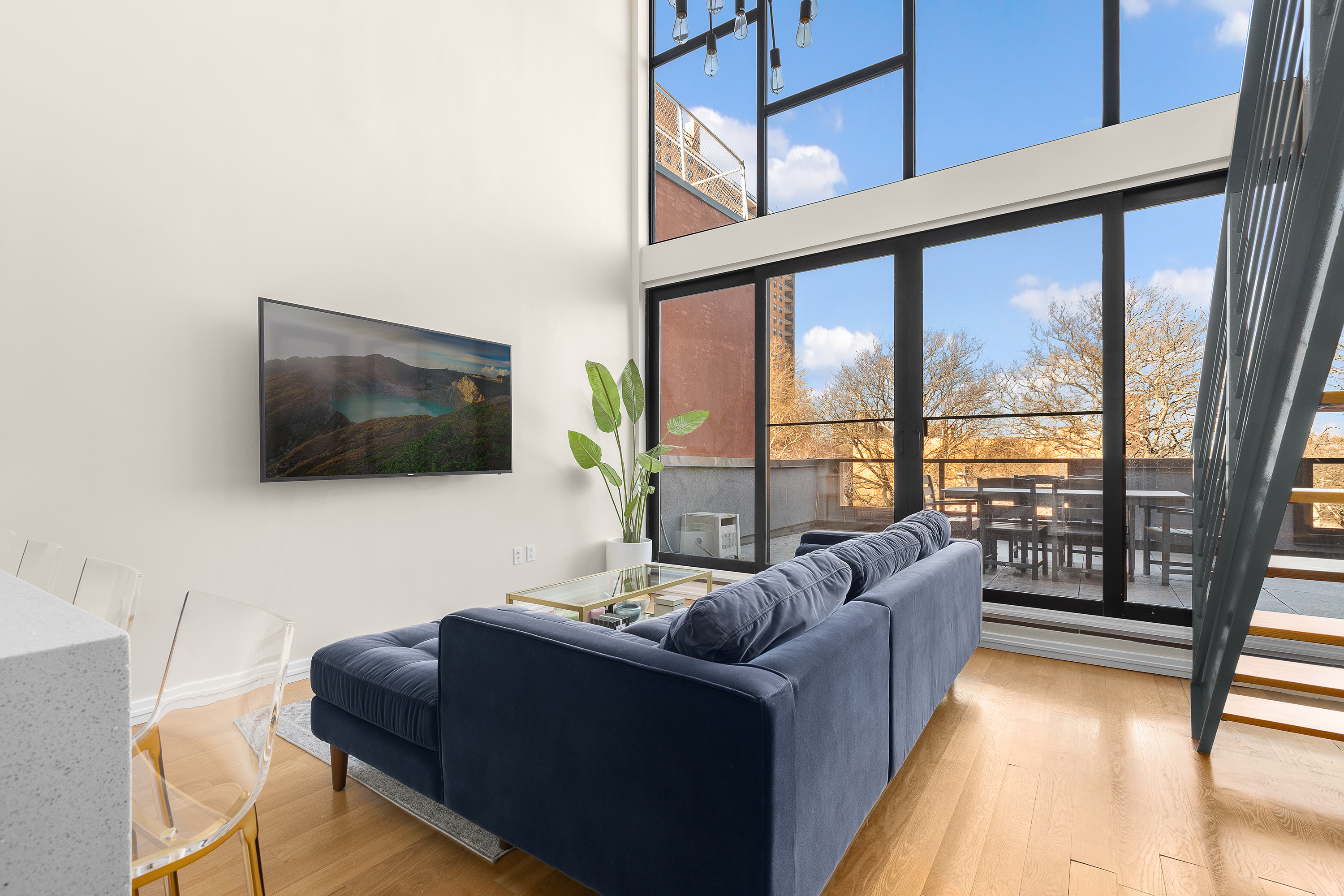364 Lafayette Avenue, Unit 4A Brooklyn, NY 11238 - Photo 2 of 12 a living room with furniture and a flat screen tv