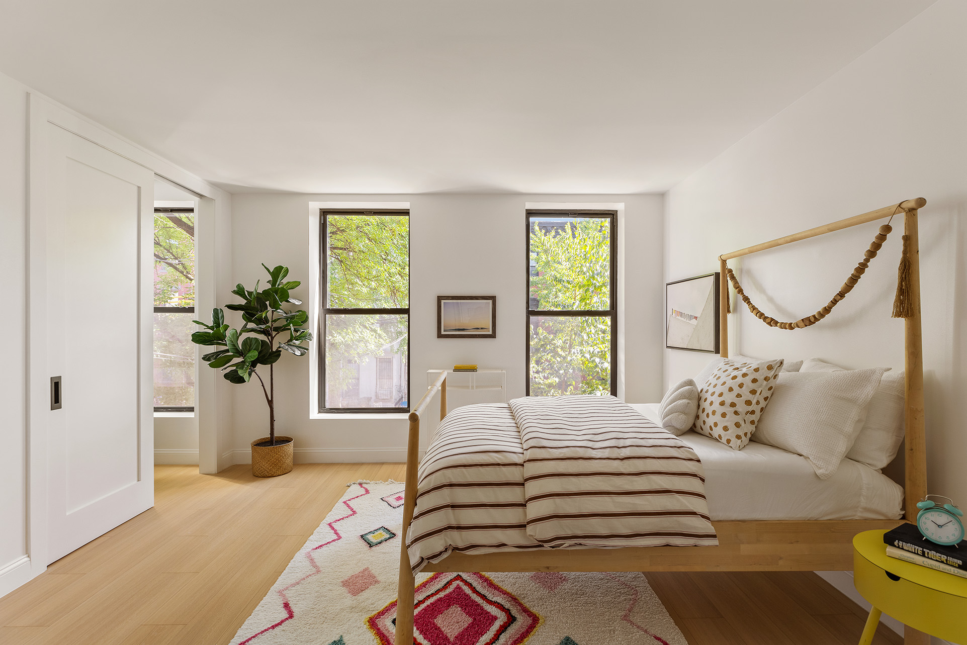 532 Clinton Street Brooklyn, NY 11231 - Photo 10 of 15 a bedroom with a bed and a window