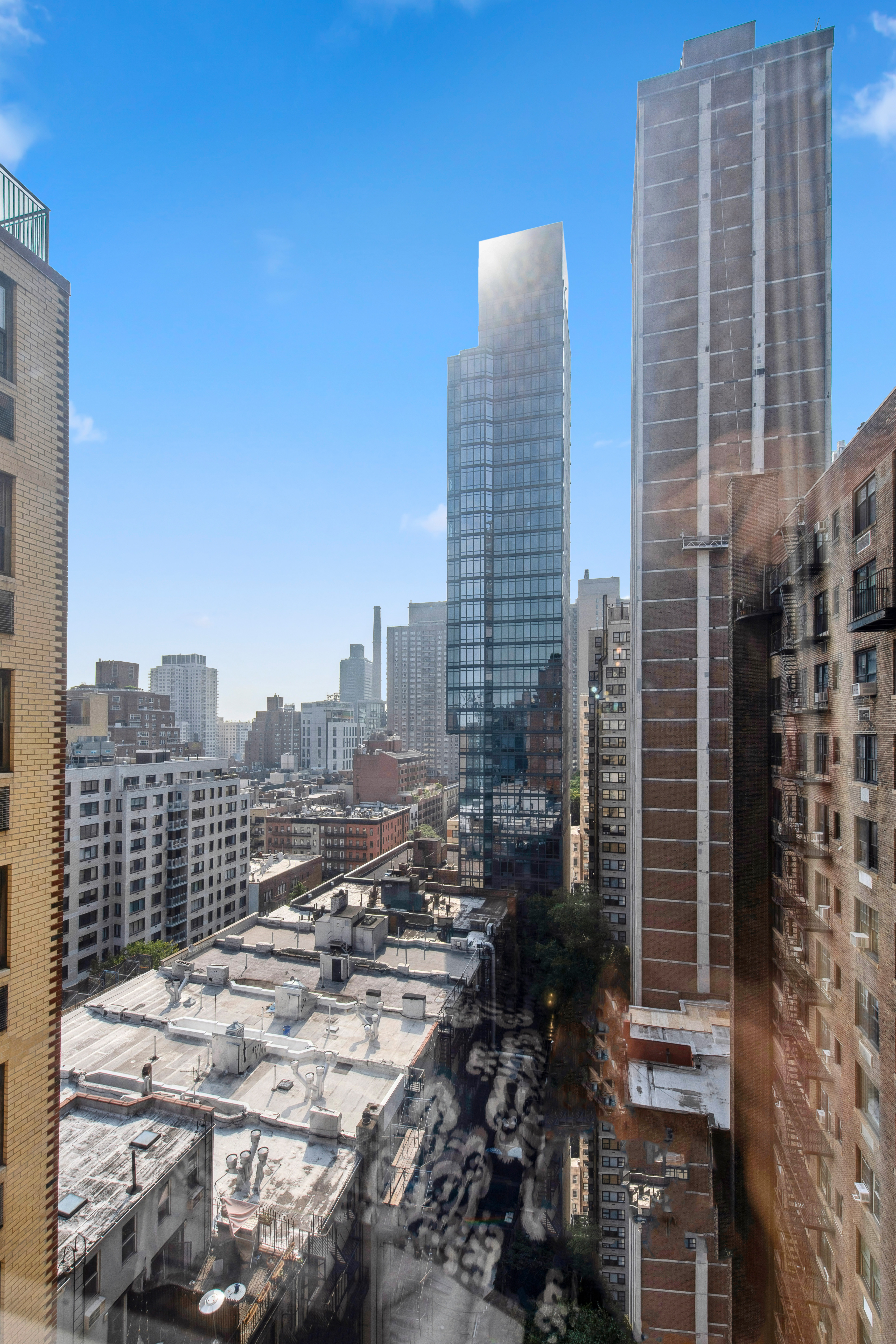 315 East 72nd Street, Unit 15M Manhattan, NY 10021 - Photo 16 of 18 a view of city with tall buildings