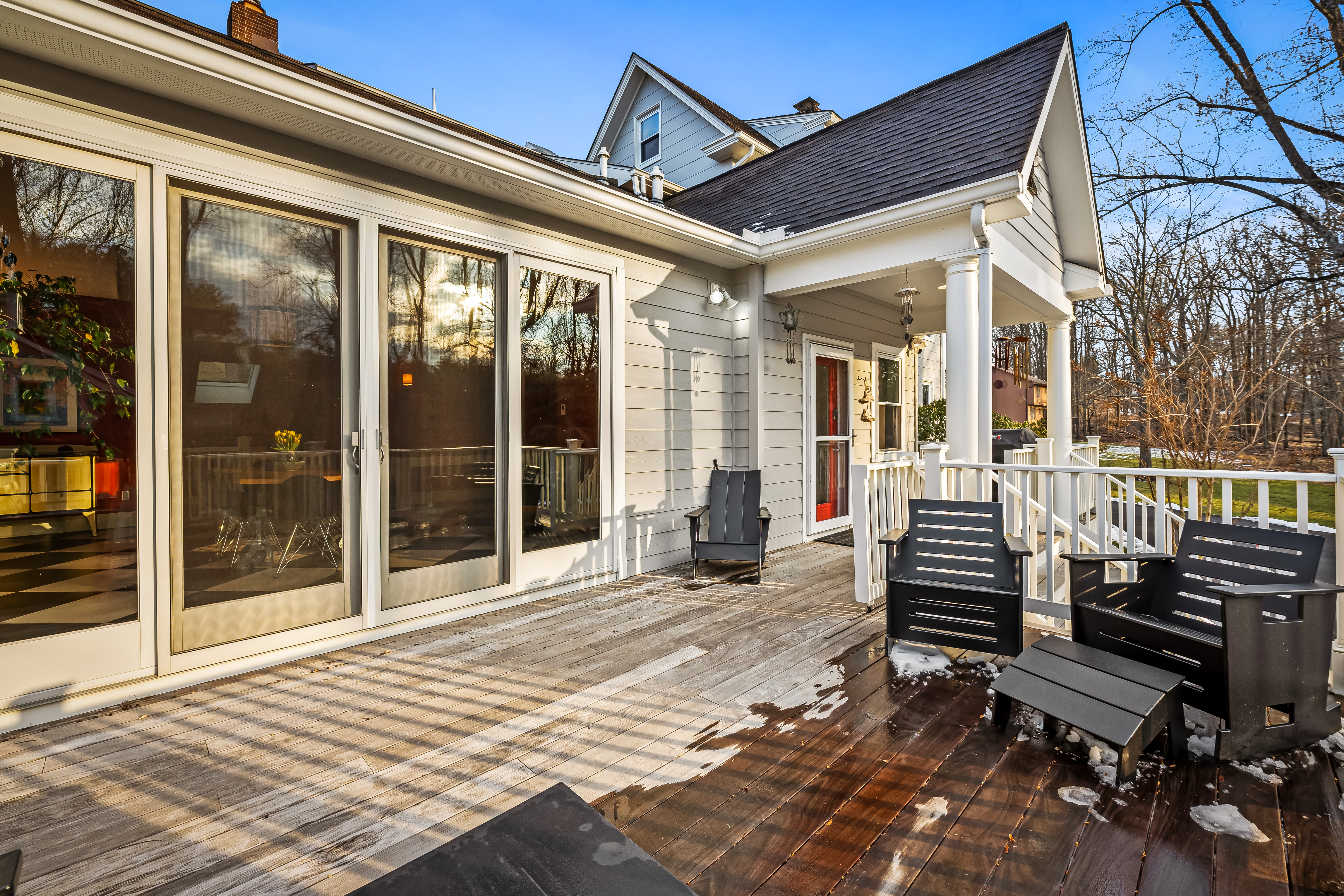 8412 Stevenson Road Pikesville, MD 21208 - Photo 66 of 81 a view of a patio with a dining table and chairs with wooden floor and fence