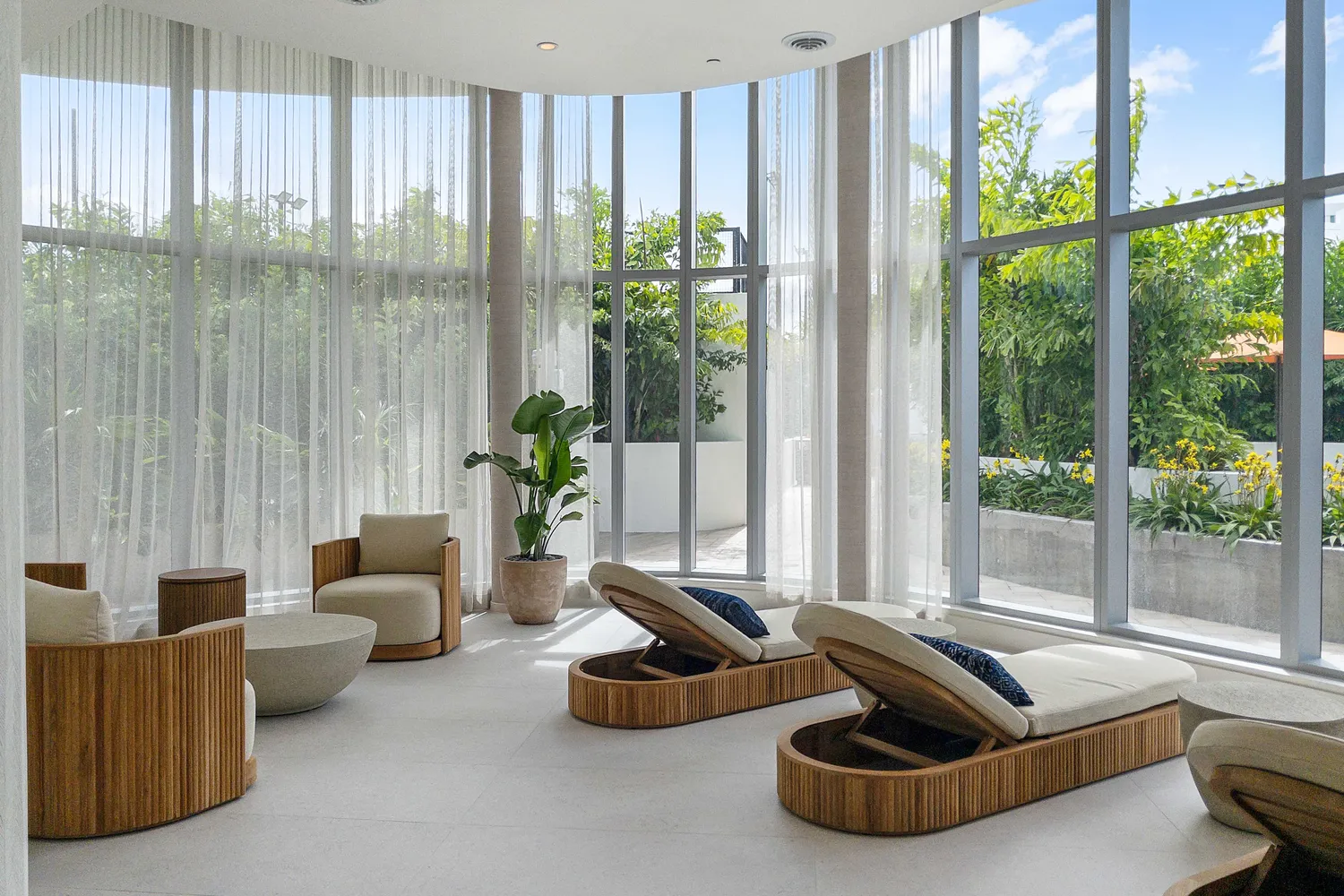 a view of potted plant sitting in front of a window