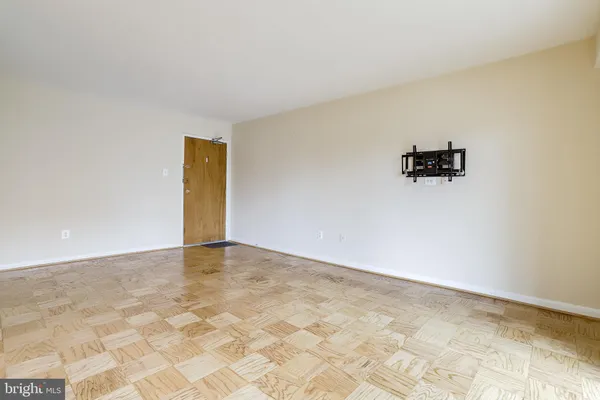 a view of an empty room and window
