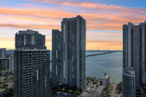 a view of a city with tall buildings