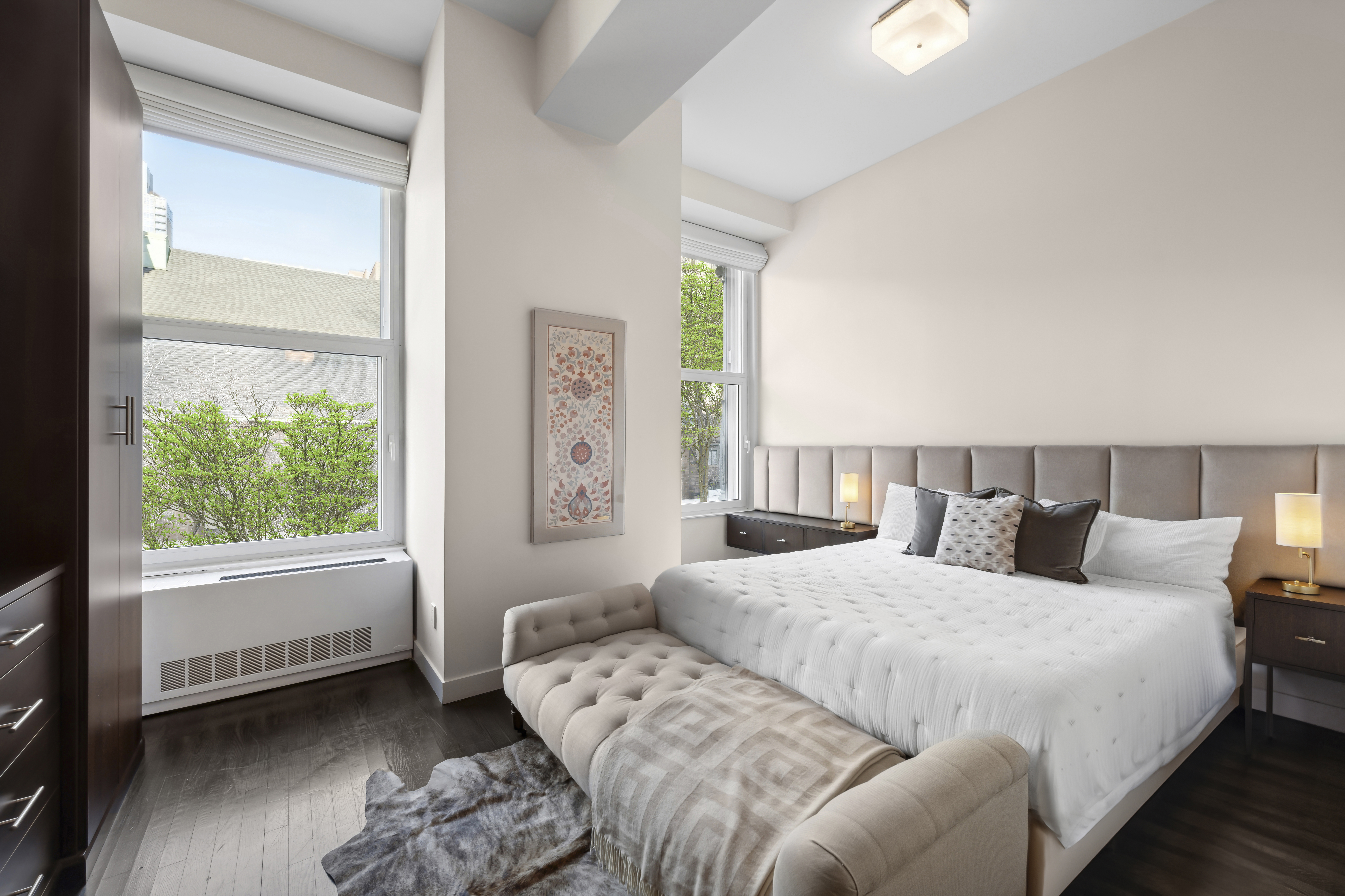 60 West 20th Street, Unit 2F Manhattan, NY 10011 - Photo 9 of 21 a bedroom with a bed and a window