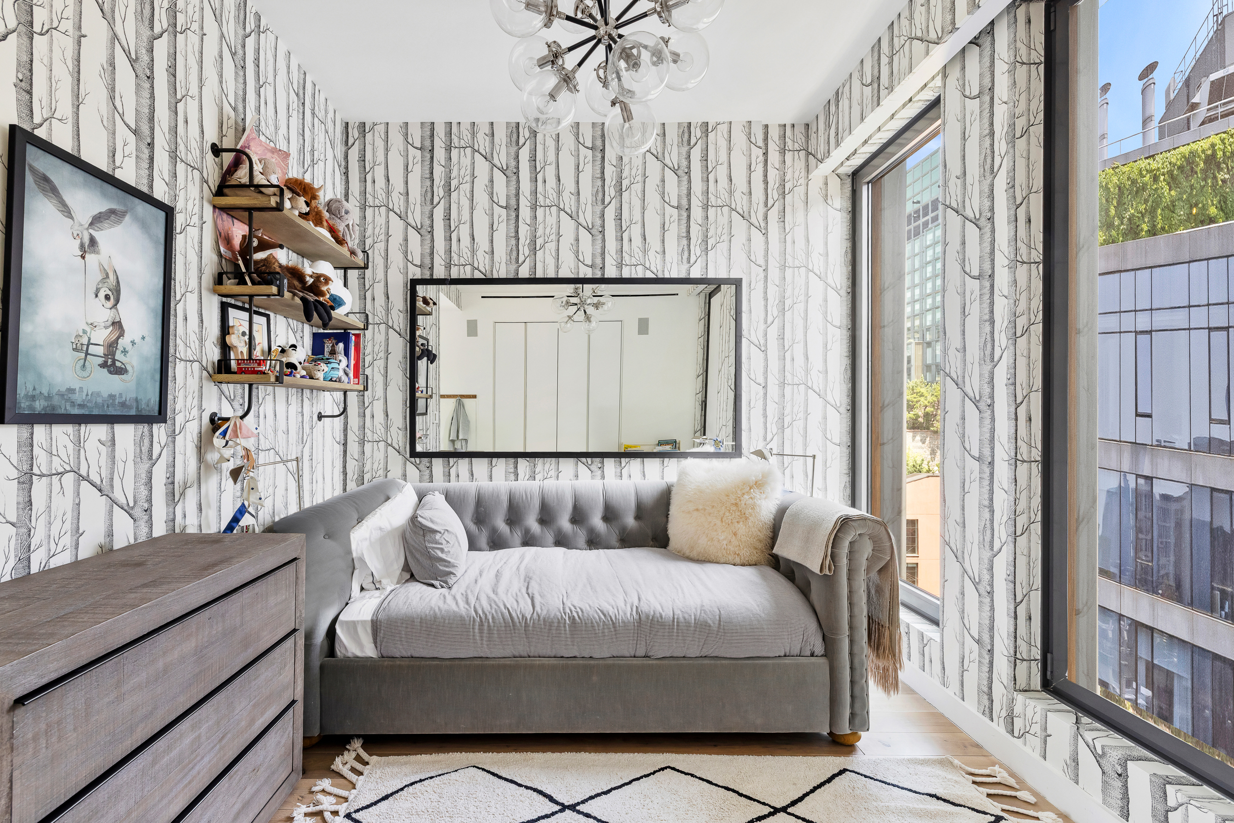 15 Renwick Street, Unit PH2 Manhattan, NY 10013 - Photo 21 of 23 a bedroom with furniture and a large window