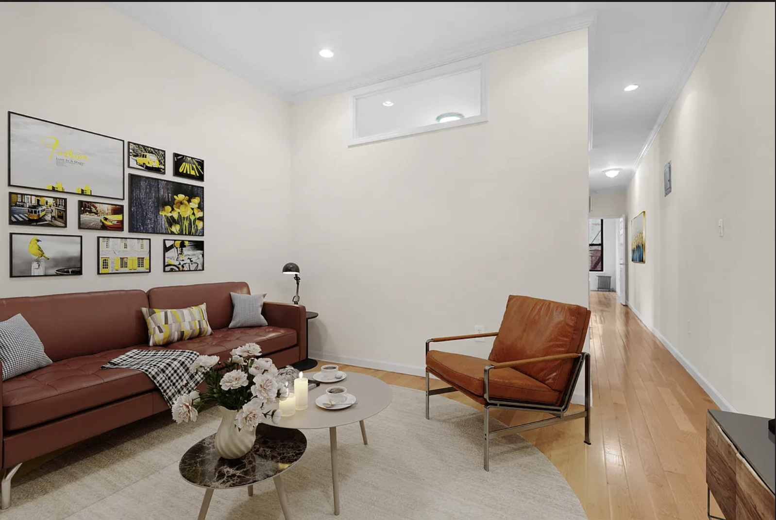 370 Columbus Avenue, Unit 2C Manhattan, NY 10024 - Photo 1 of 10 a living room with furniture and wooden floor