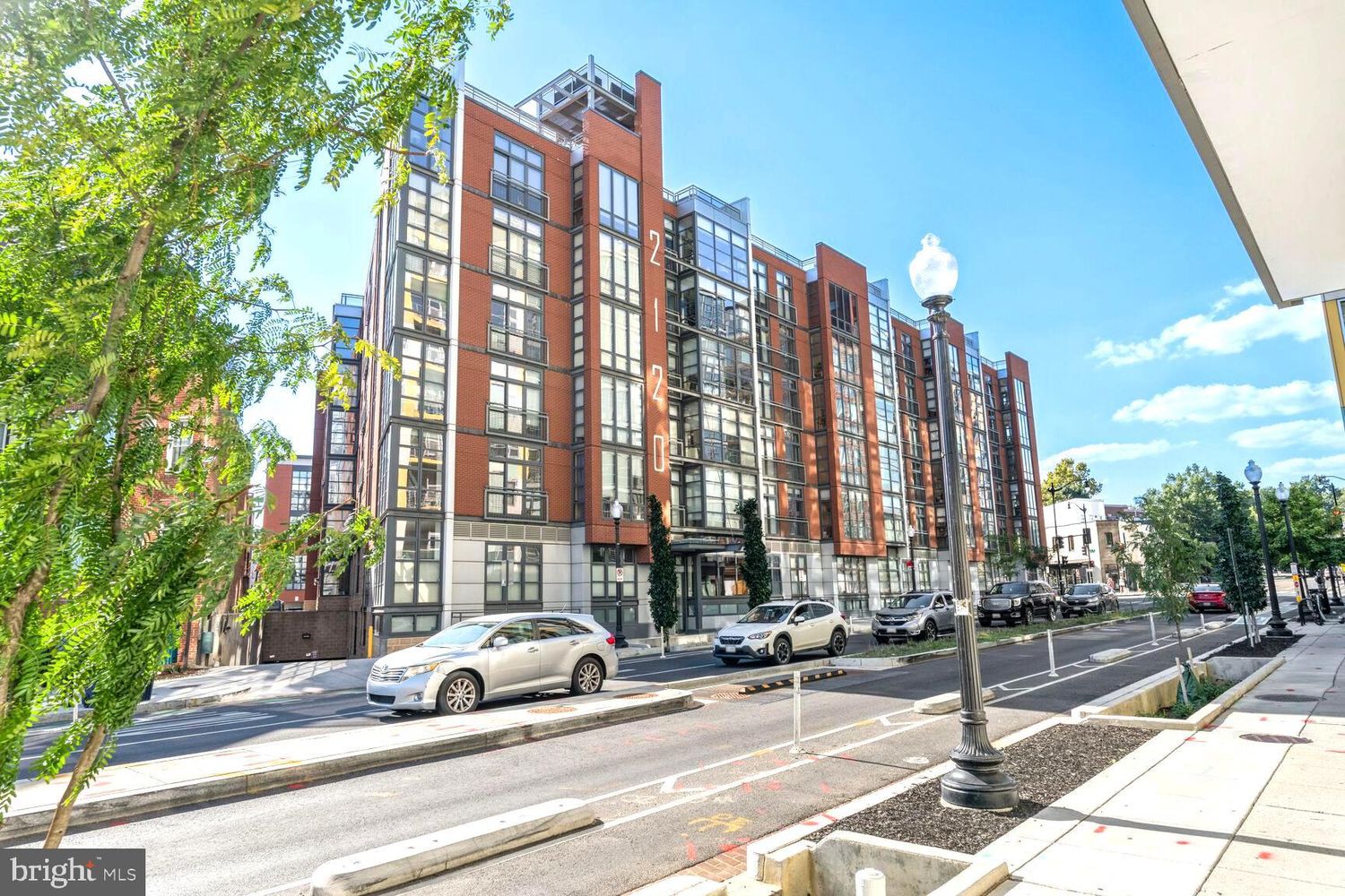 2120 Vermont Avenue Northwest, Unit 620 Washington, DC 20001 - Photo 4 of 61 a view of street with a cars parked in front of it