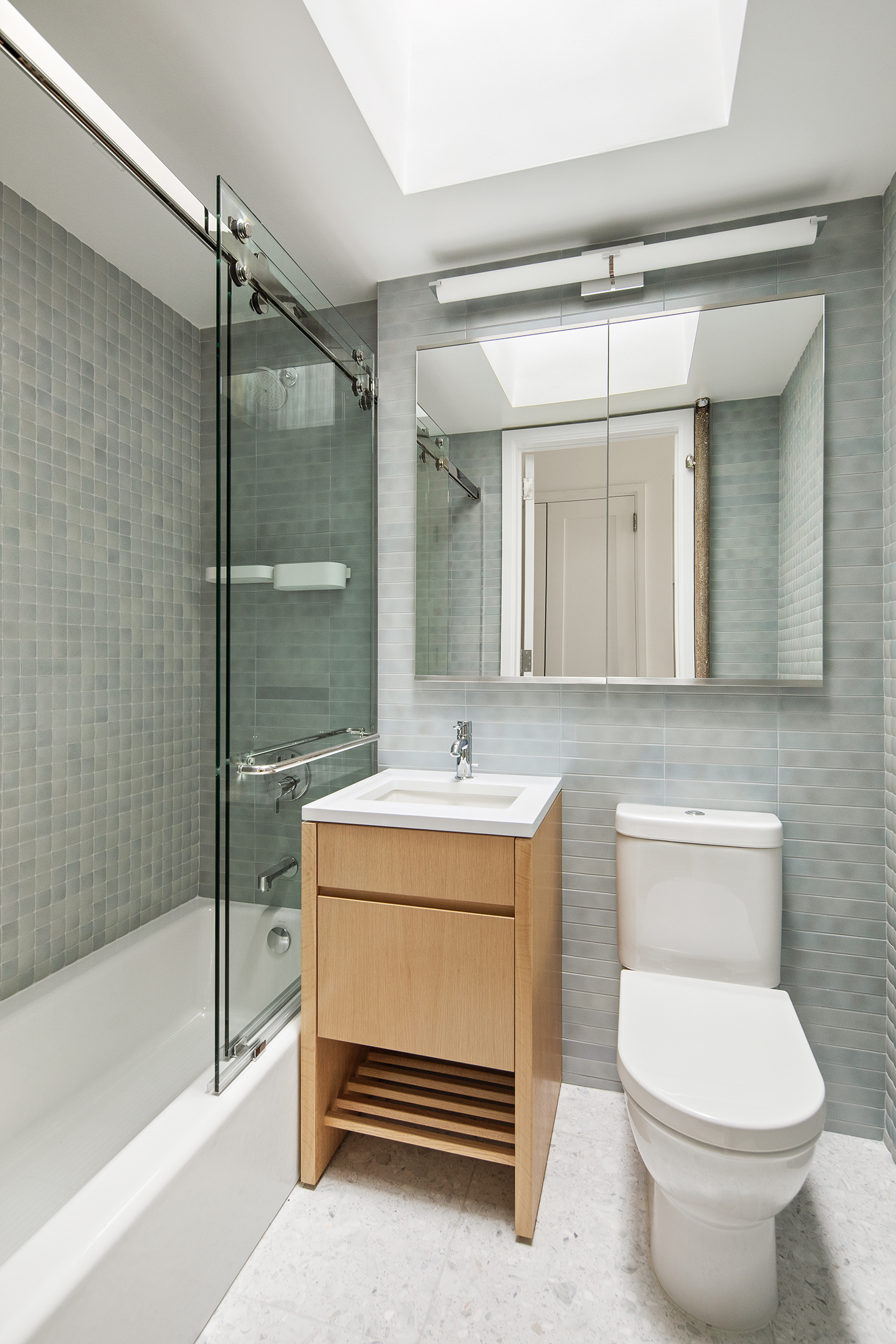 435 East 85th Street, Unit 4P Manhattan, NY 10028 - Photo 6 of 9 a bathroom with a sink toilet and shower