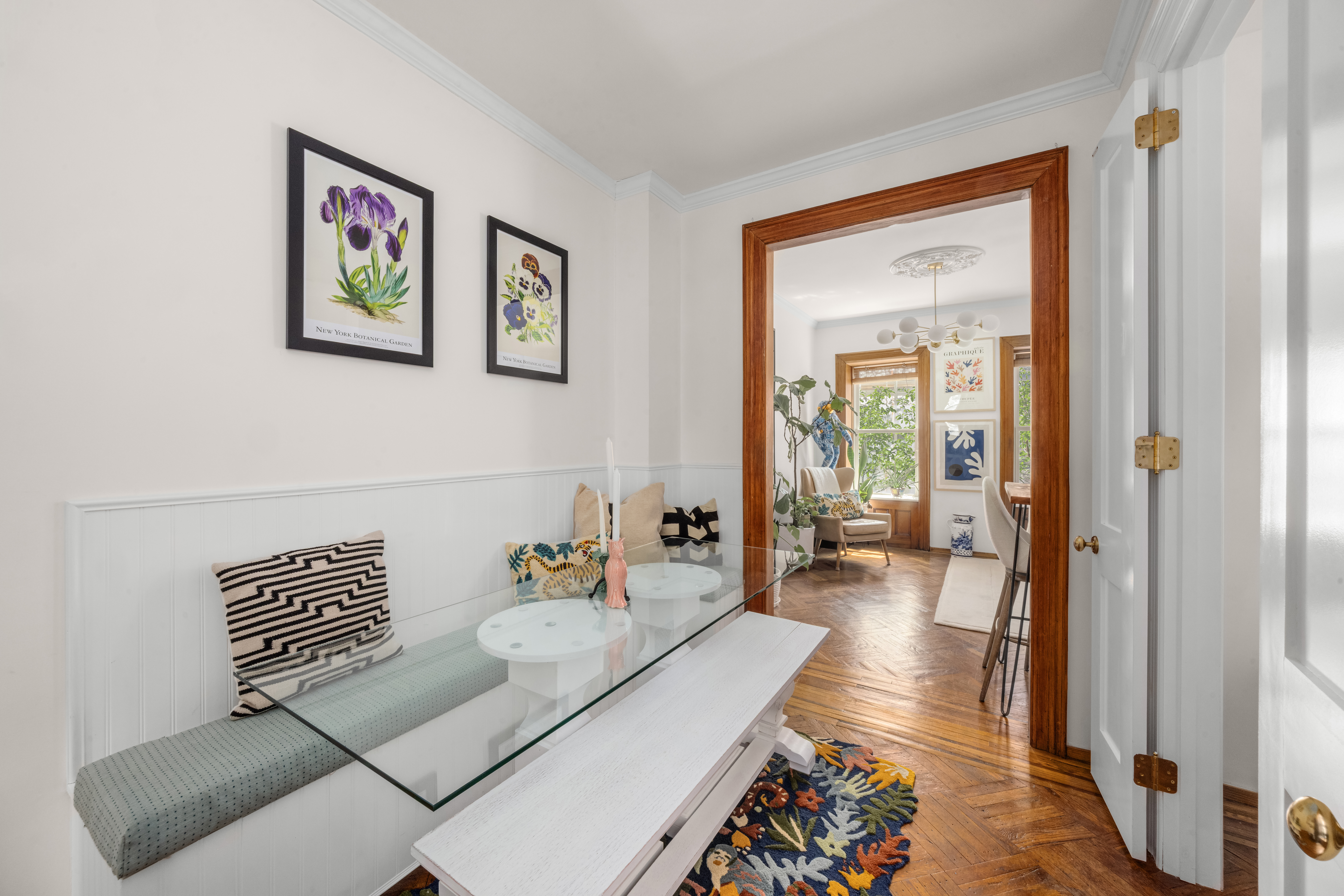 237 West 11th Street, Unit 2B Manhattan, NY 10014 - Photo 4 of 13 a living room with furniture and wooden floor