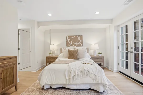a bathroom with a white bath tub and a shower curtain