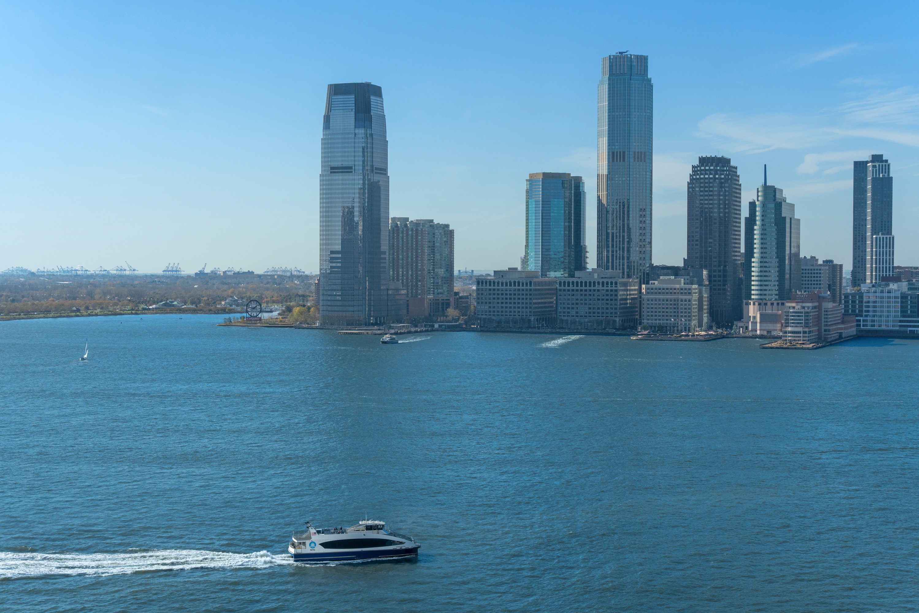212 Warren Street, Unit 20A Manhattan, NY 10282 - Photo 4 of 23 a view of a city with tall buildings