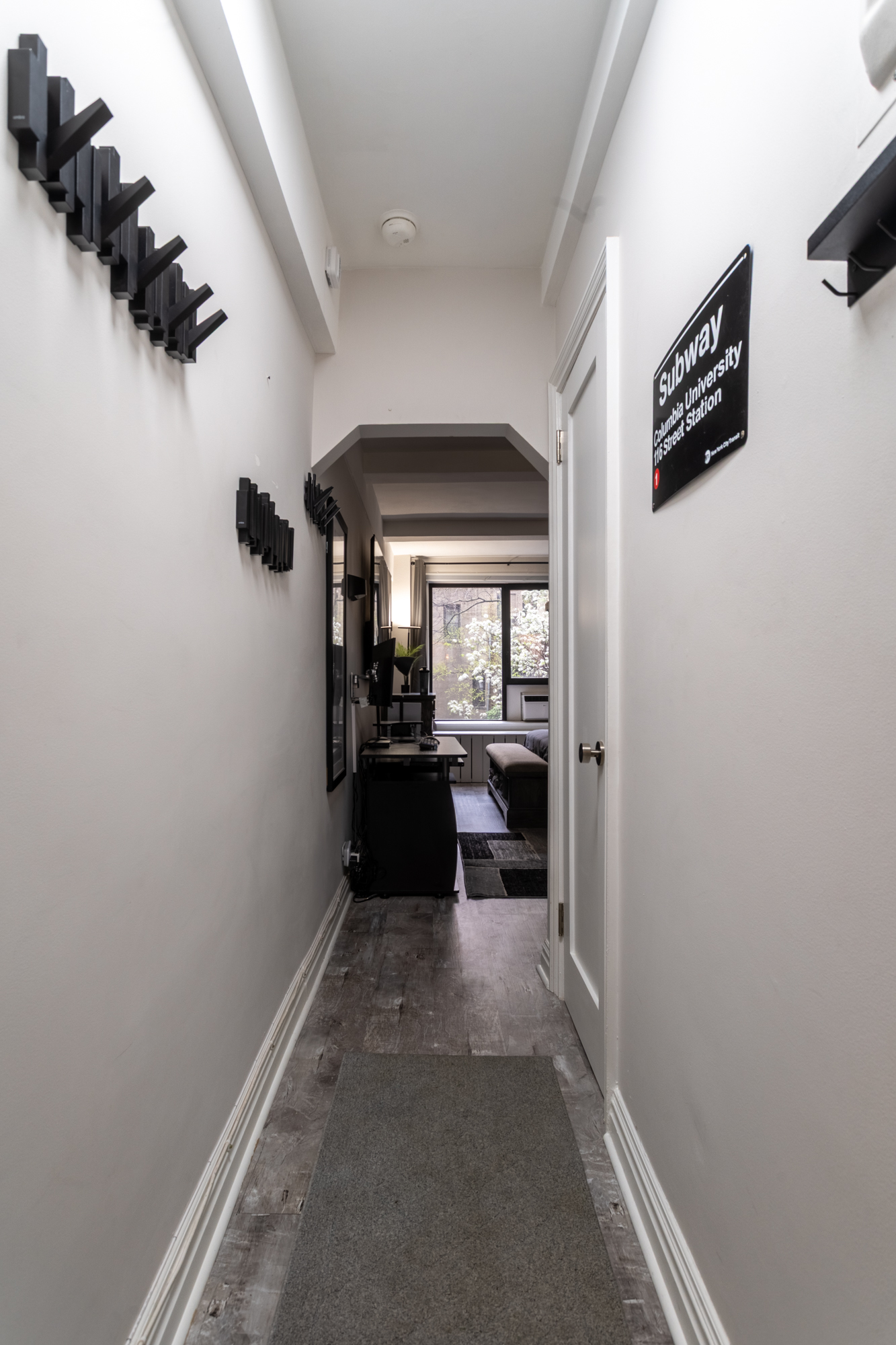 235 West 102nd Street, Unit 3T Manhattan, NY 10025 - Photo 5 of 10 a view of a hallway and a livingroom with wooden floor